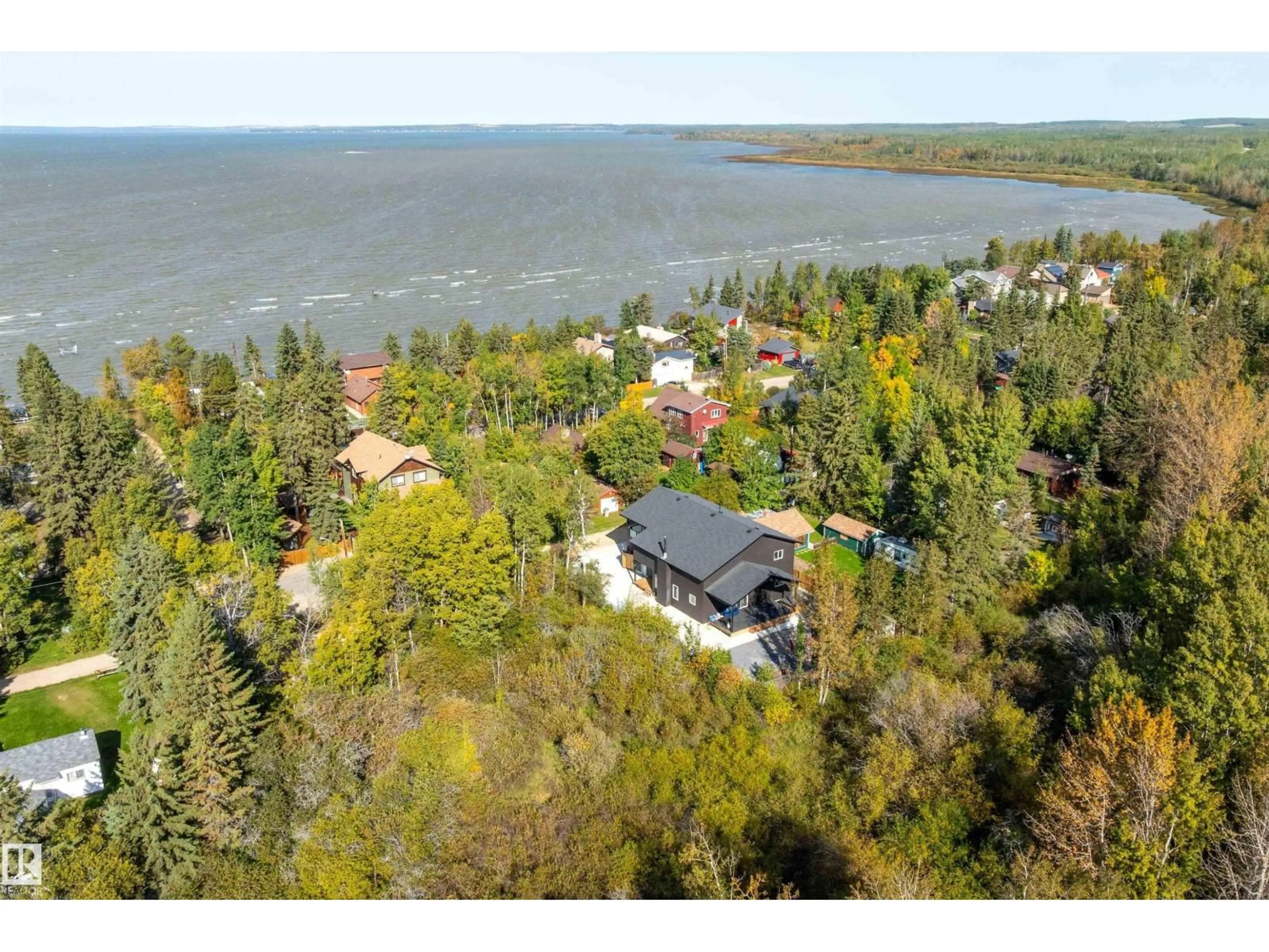 A pic from outside/outdoor area/front of a property/back of a property/a pic from drone, water/lake/river/ocean view for 213 2ND AVENUE, Rural Wetaskiwin County Alberta T0C1X0