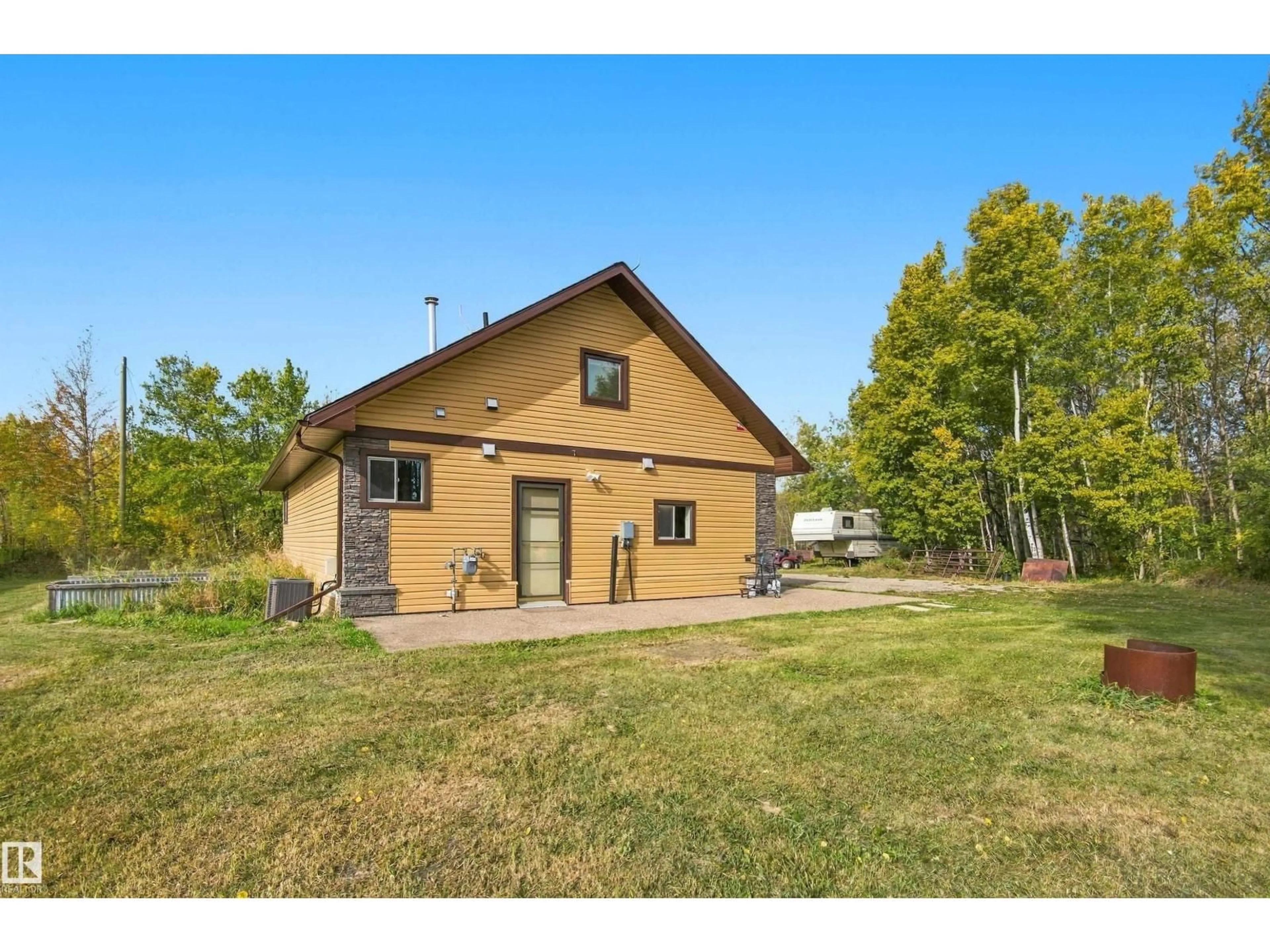 A pic from outside/outdoor area/front of a property/back of a property/a pic from drone, unknown for 217 - 51069 RGE RD 215, Rural Strathcona County Alberta T8E1G7