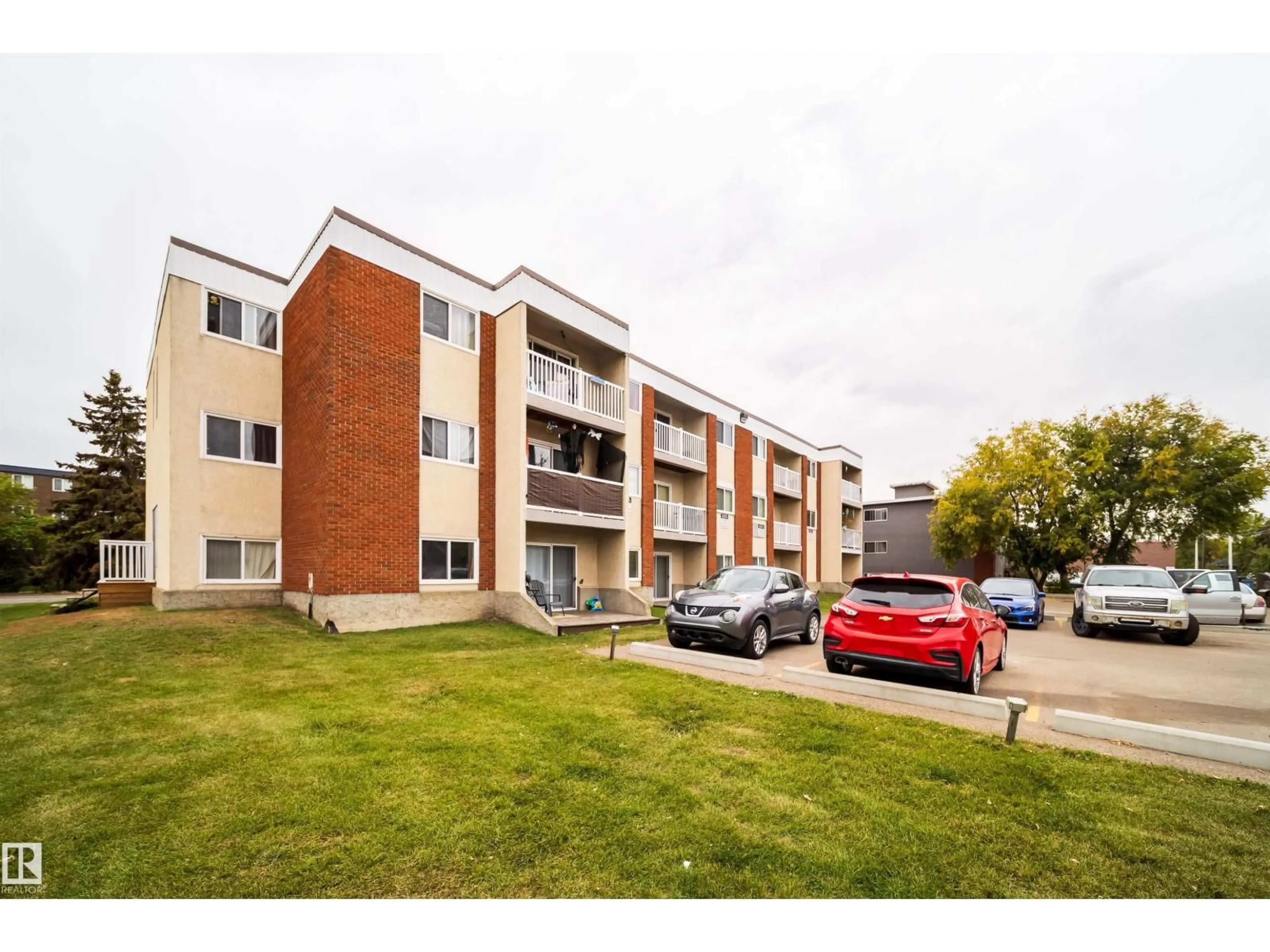 A pic from outside/outdoor area/front of a property/back of a property/a pic from drone, street for 202 - 10615 156 ST, Edmonton Alberta T5P2S2