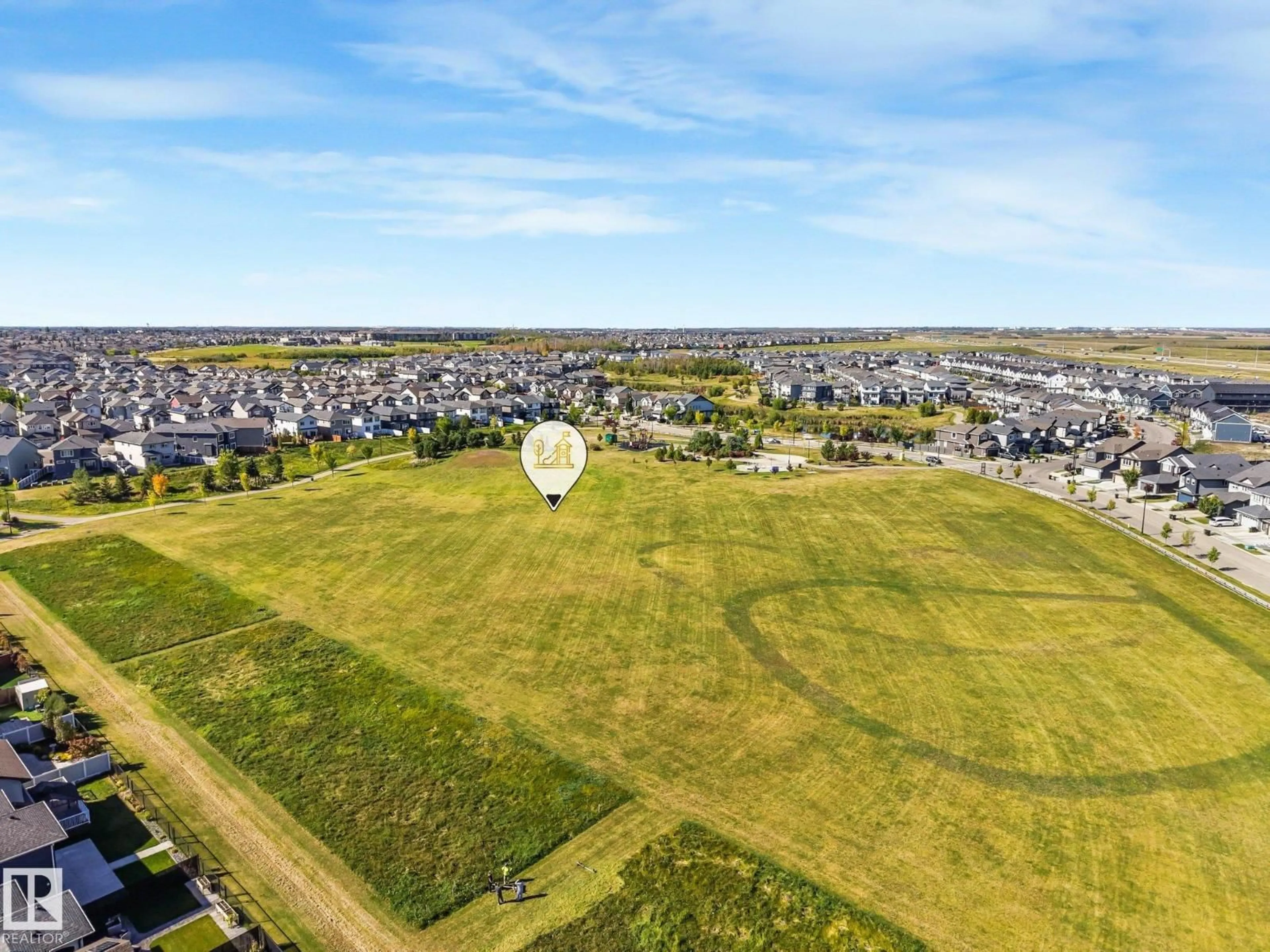 A pic from outside/outdoor area/front of a property/back of a property/a pic from drone, unknown for NW - 4014 171A AV, Edmonton Alberta T5Y0Z4