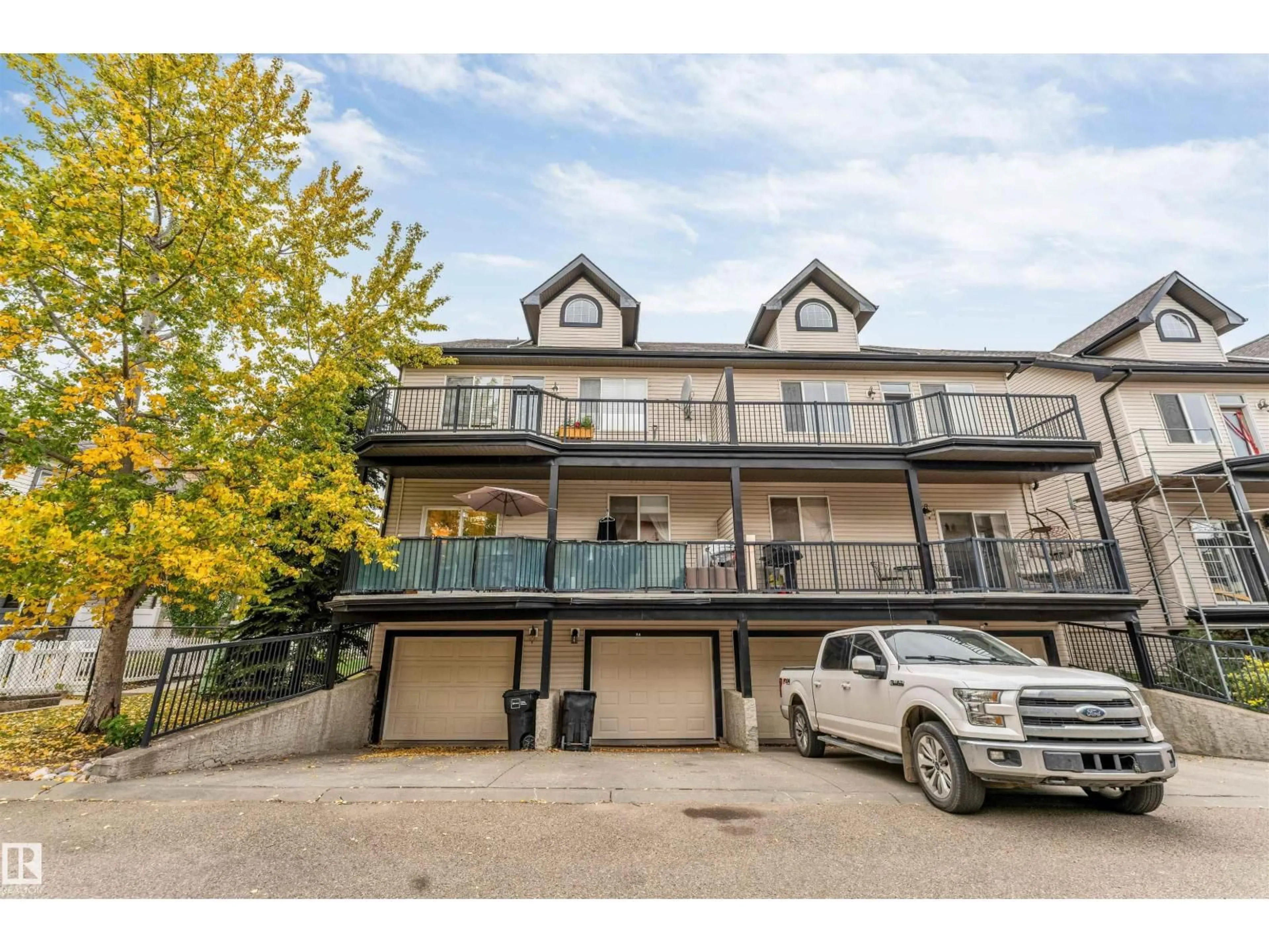 A pic from outside/outdoor area/front of a property/back of a property/a pic from drone, street for #54 - 1650 TOWNE CENTER BV, Edmonton Alberta T6R0C5