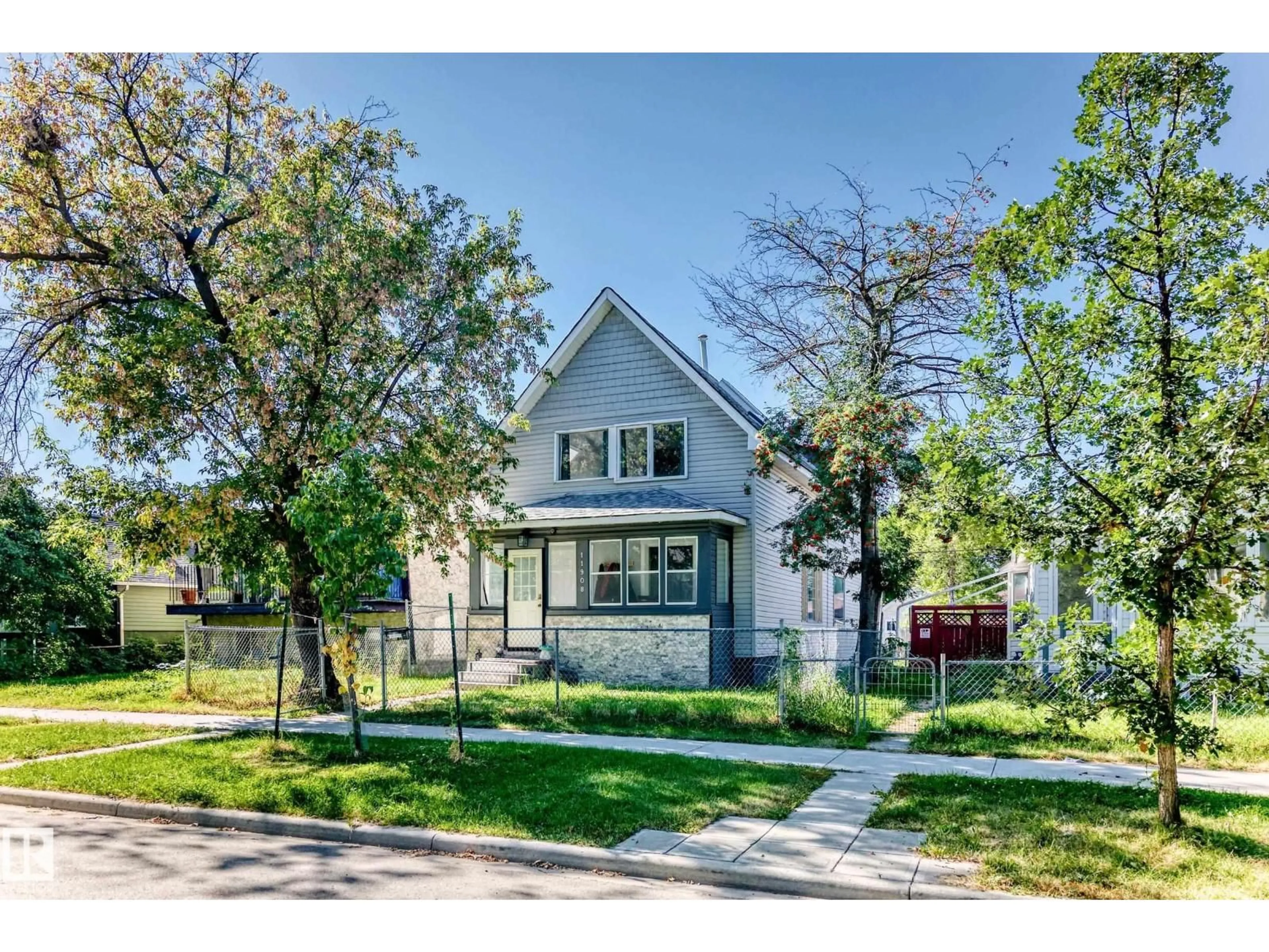 Home with vinyl exterior material, street for NW - 11908 77 ST, Edmonton Alberta T5B2G4