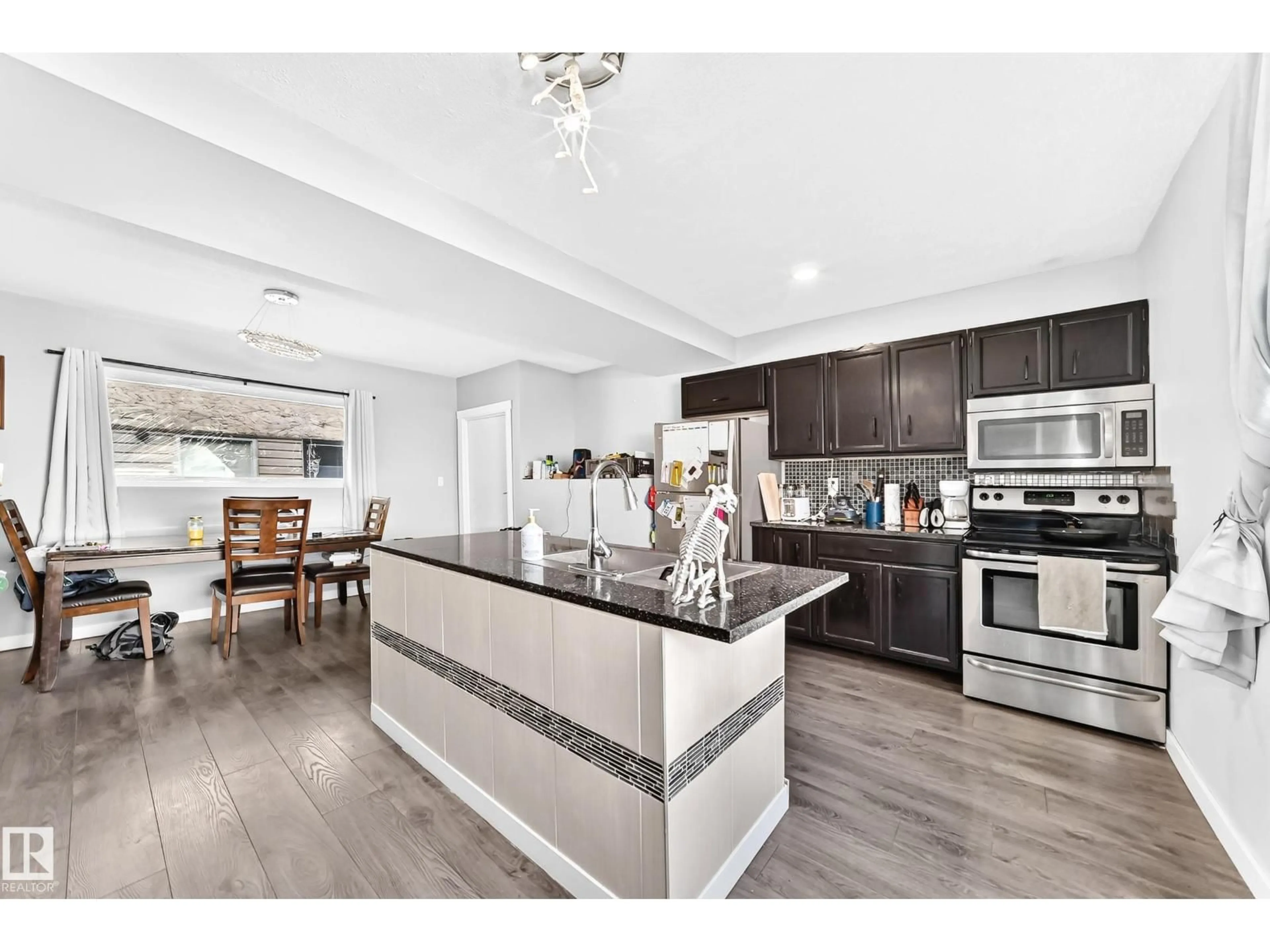 Open concept kitchen, unknown for NW - 11908 77 ST, Edmonton Alberta T5B2G4