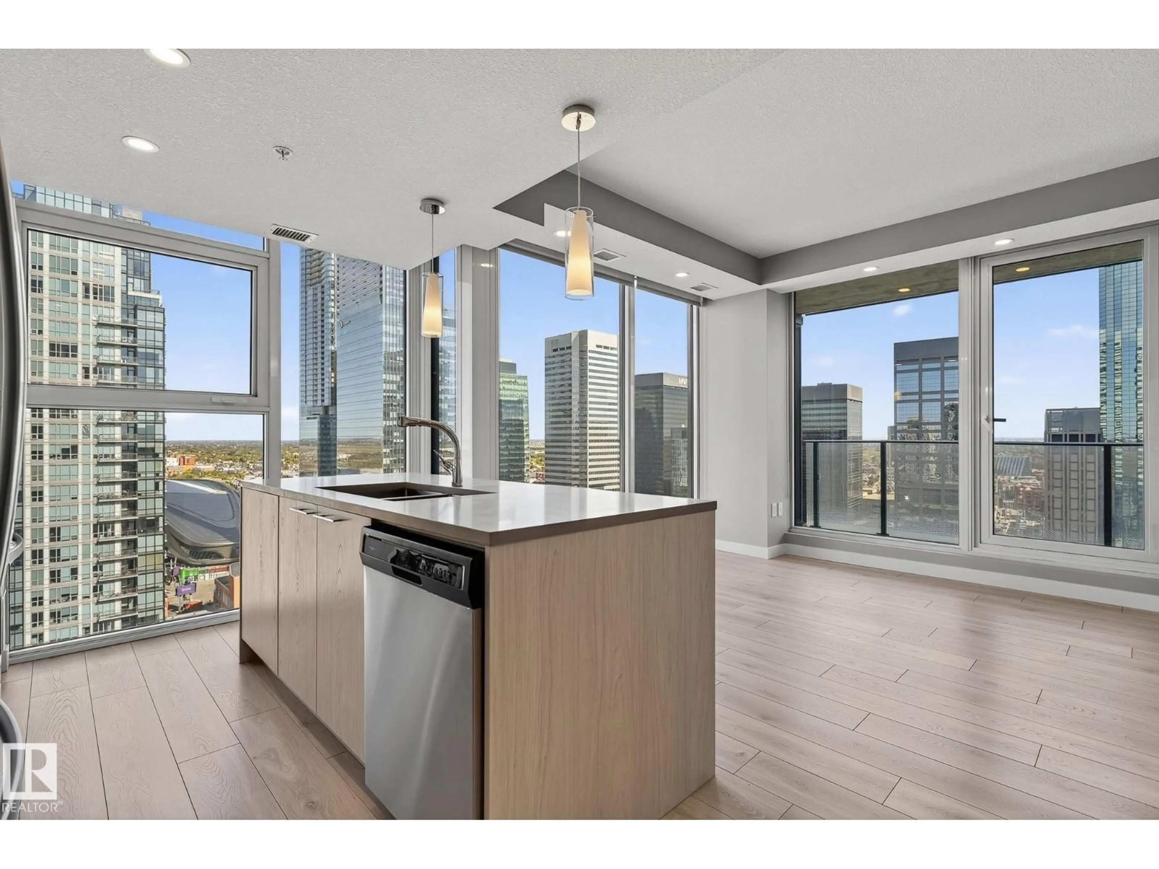 Open concept kitchen, wood/laminate floor for 3103 - 10180 103 ST, Edmonton Alberta T5J0L1