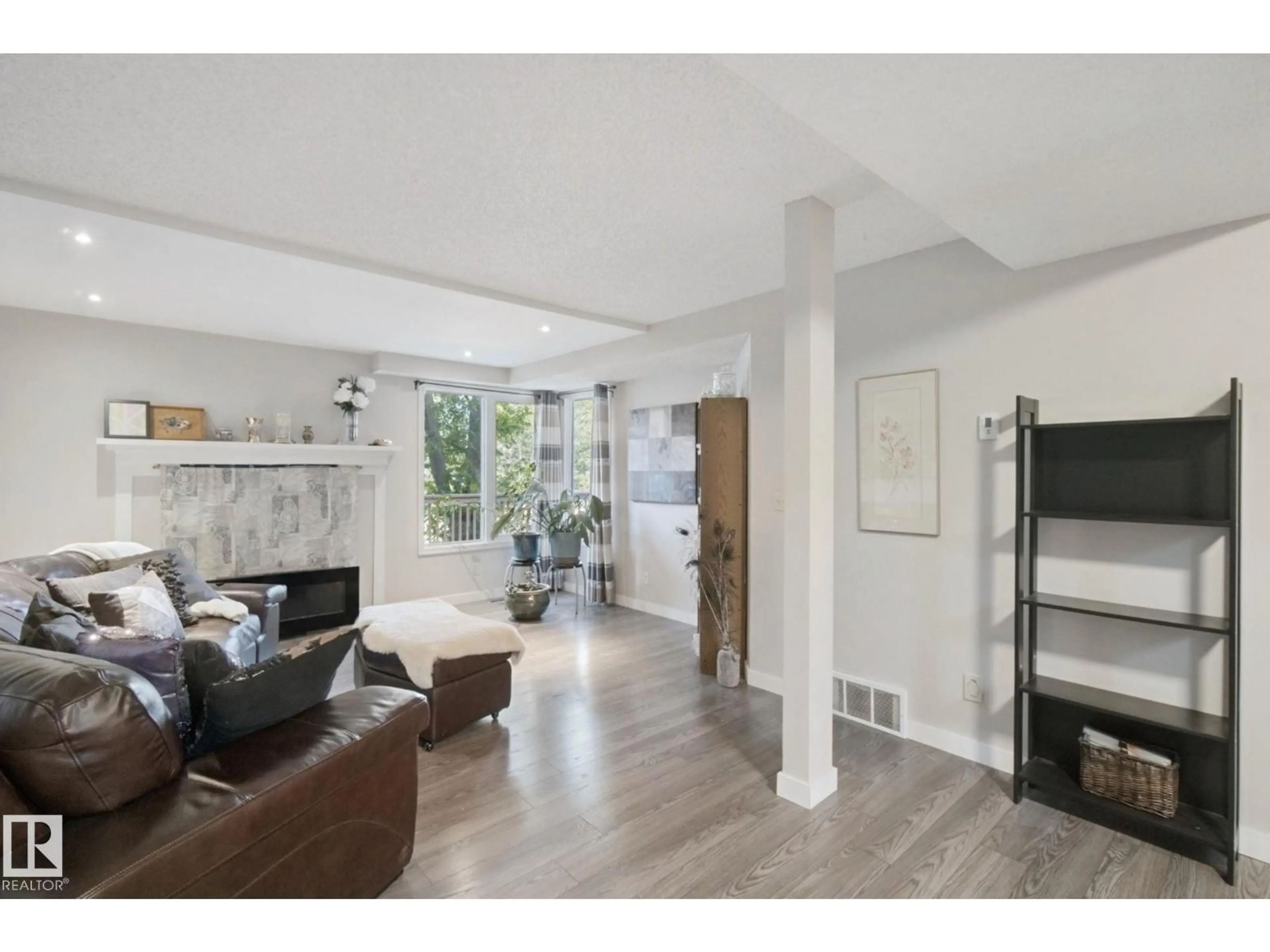 Living room with furniture, unknown for 14812 43 AV, Edmonton Alberta T6H5S1