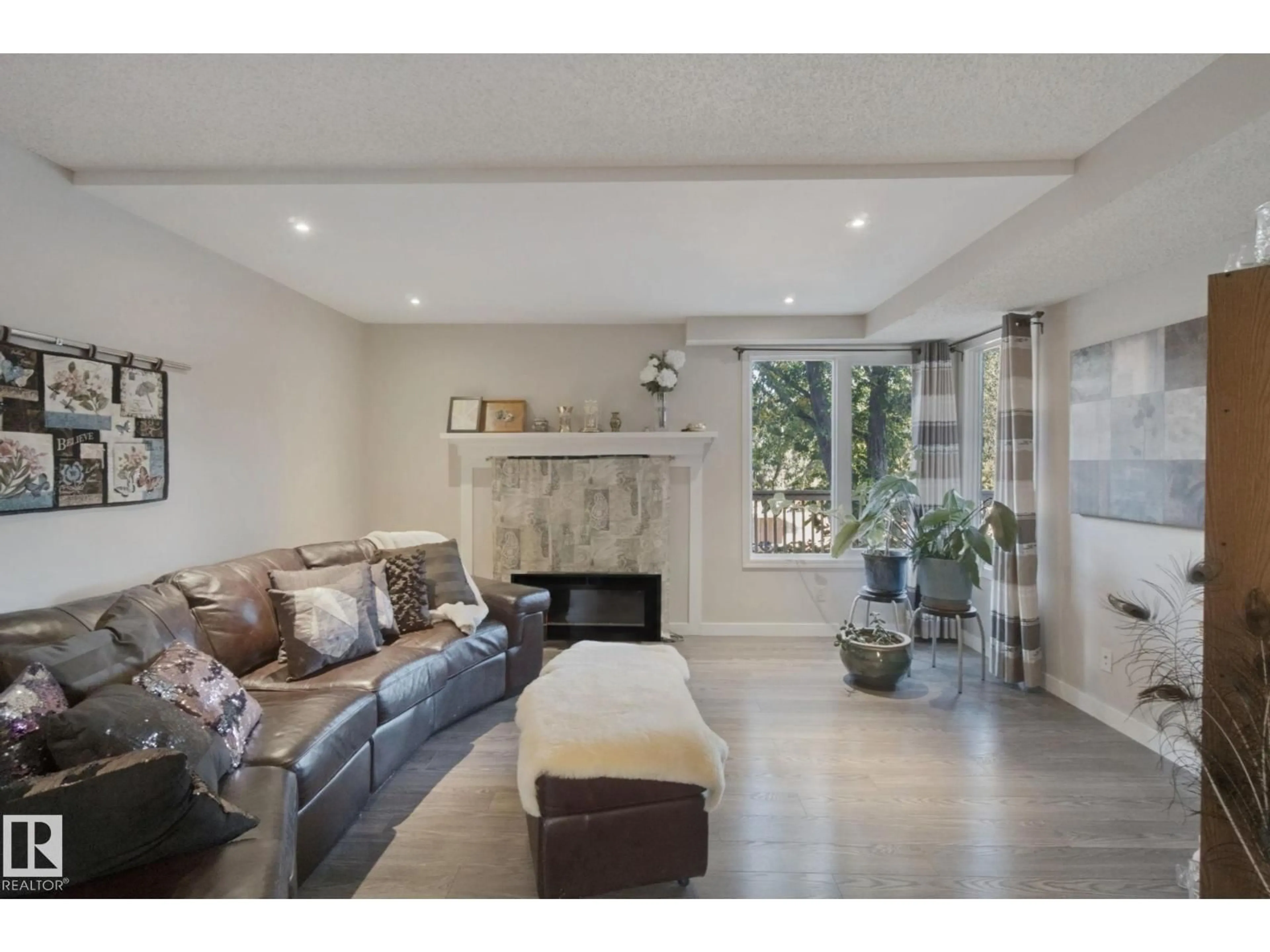 Living room with furniture, unknown for 14812 43 AV, Edmonton Alberta T6H5S1
