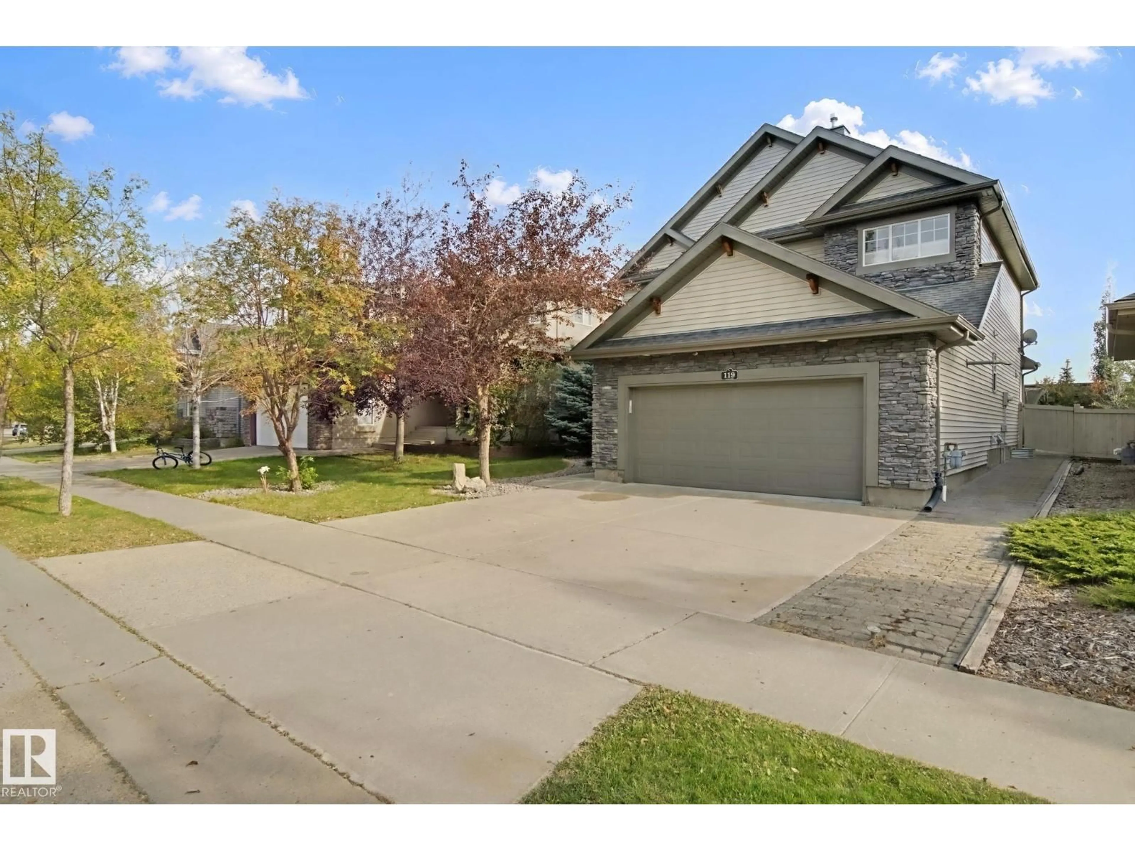 A pic from outside/outdoor area/front of a property/back of a property/a pic from drone, street for 119 CALDWELL WY, Edmonton Alberta T6M2W9