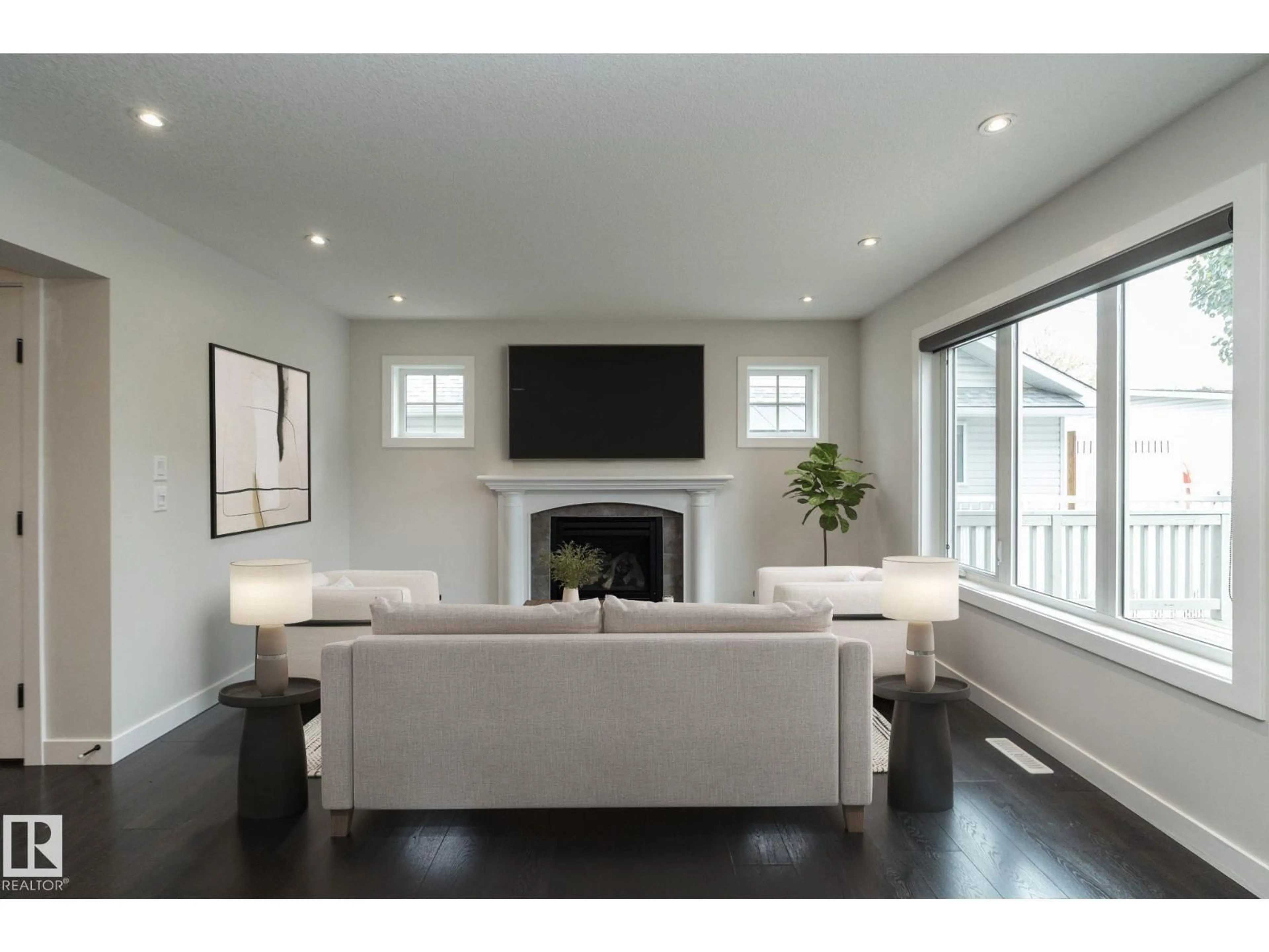 Living room with furniture, wood/laminate floor for 53 MICHIGAN ST, Devon Alberta T9G1H7