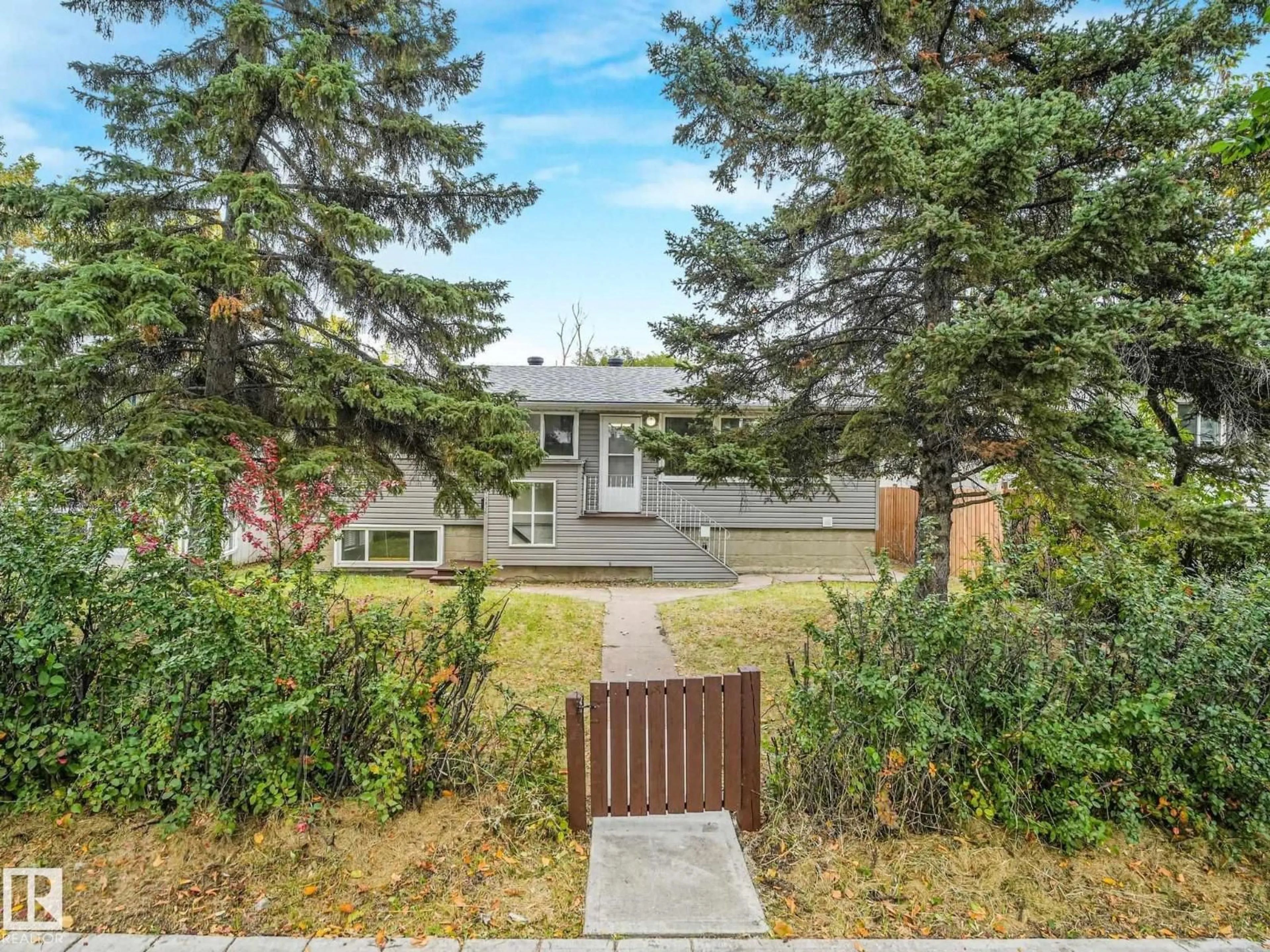 A pic from outside/outdoor area/front of a property/back of a property/a pic from drone, street for 12823 125 ST, Edmonton Alberta T5L0V1