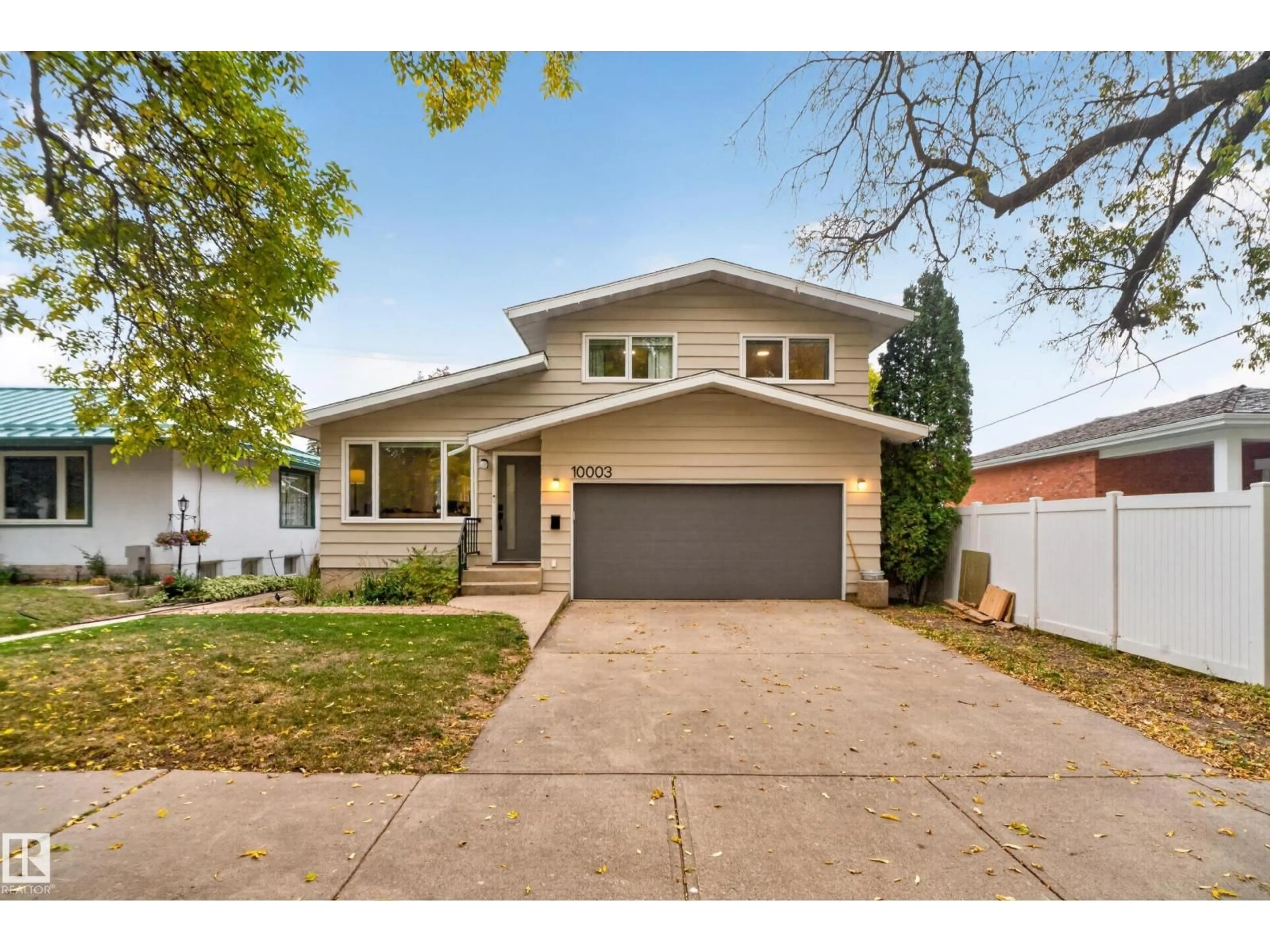 Home with brick exterior material, street for 10003 107, Fort Saskatchewan Alberta T8L2H5