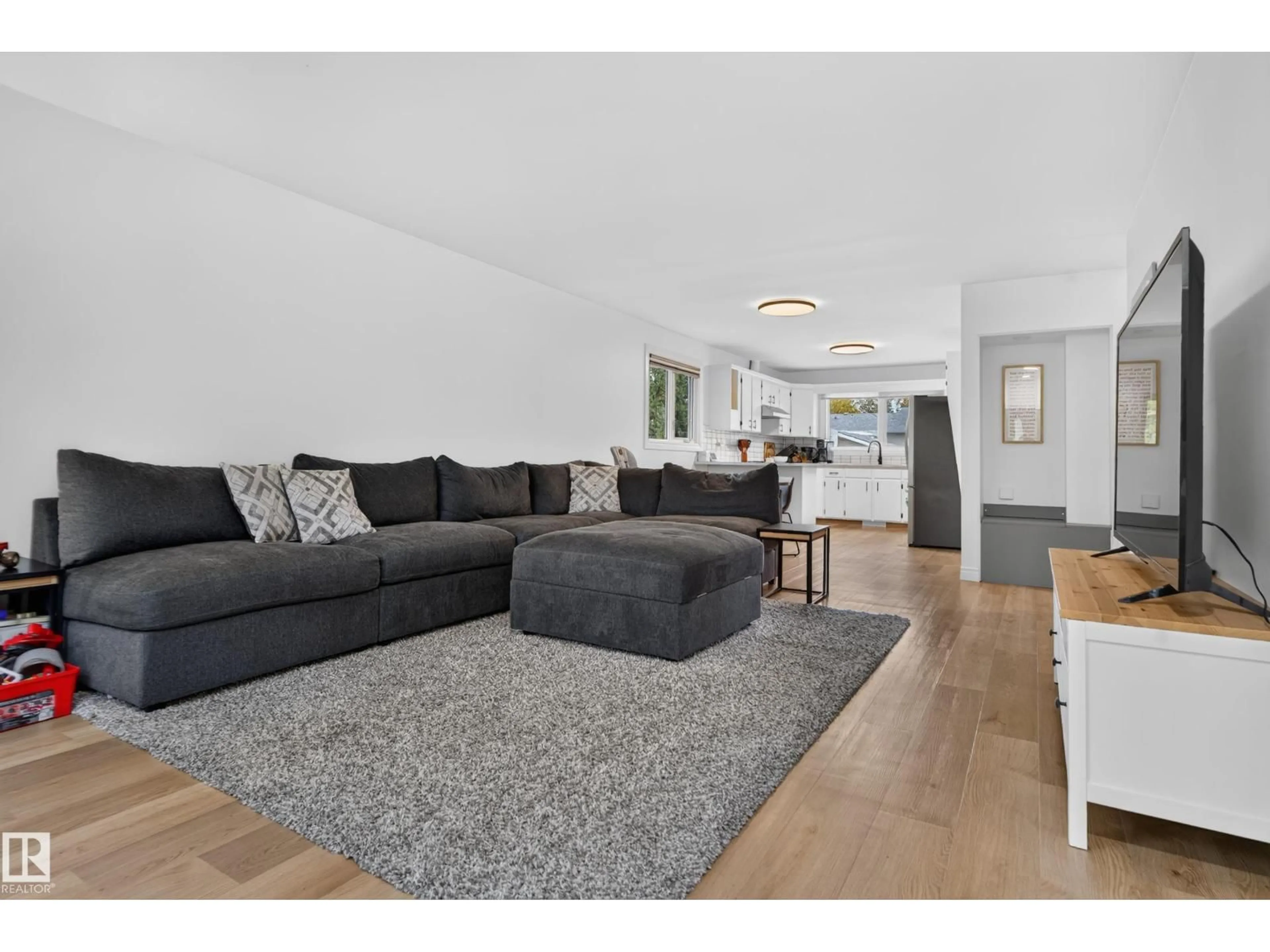 Living room with furniture, unknown for 10003 107, Fort Saskatchewan Alberta T8L2H5