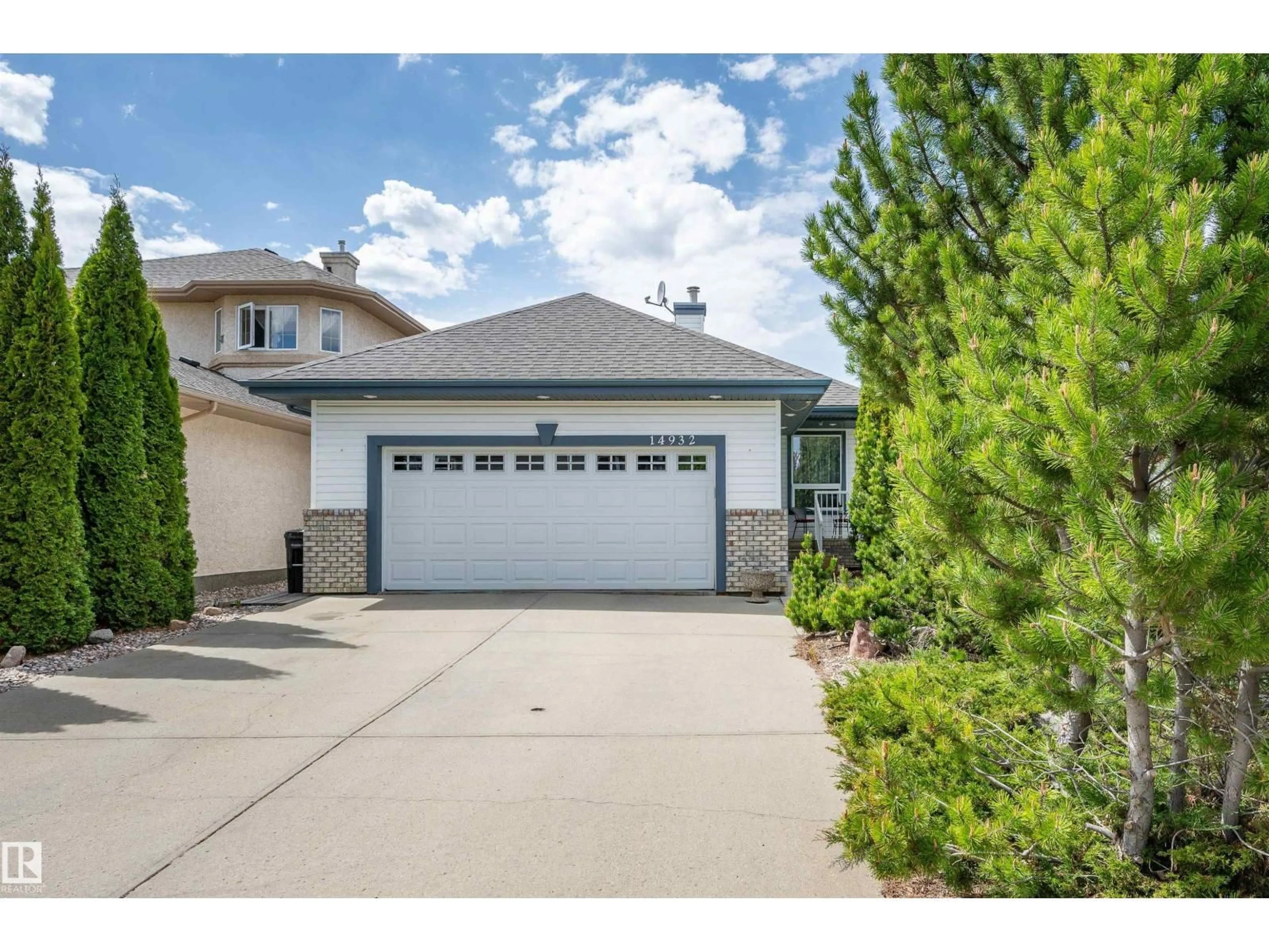 Home with vinyl exterior material, street for NW - 14932 136 ST, Edmonton Alberta T6V1M3