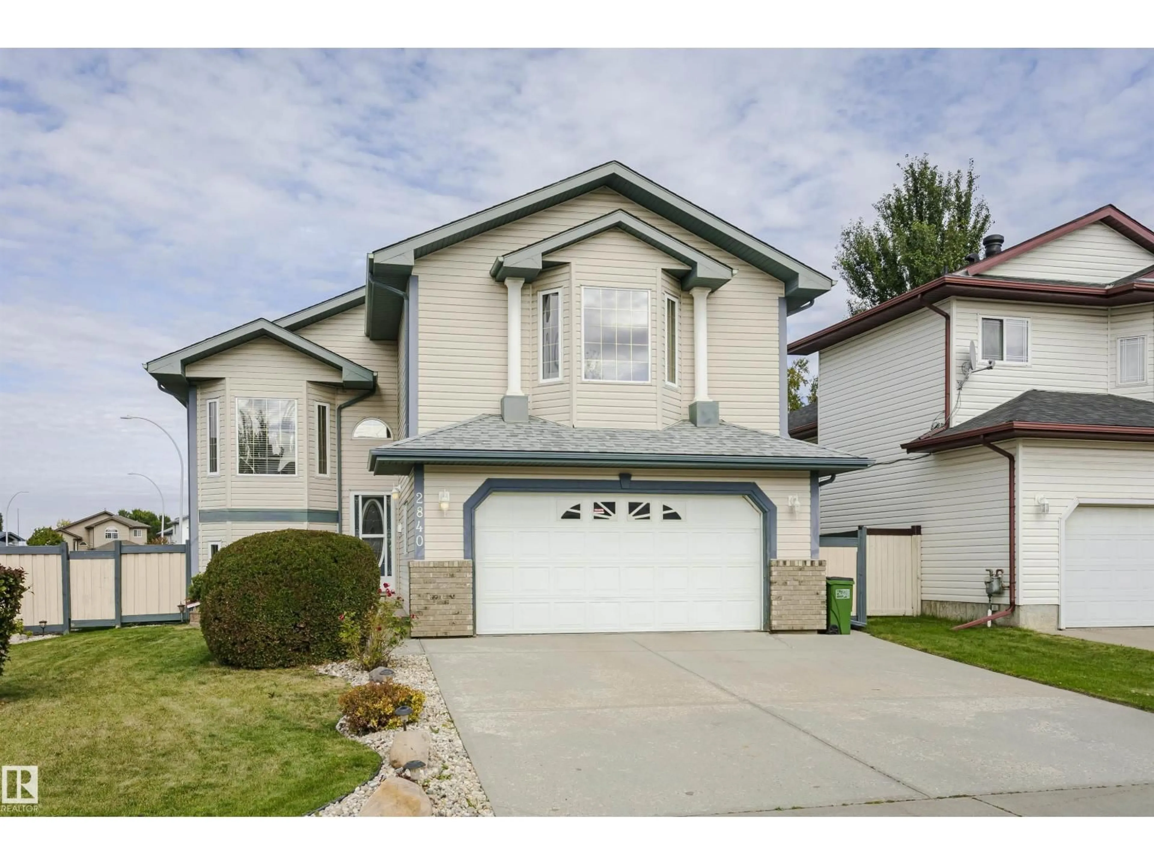 Home with vinyl exterior material, street for 2840 151A AV, Edmonton Alberta T5Y2Y8