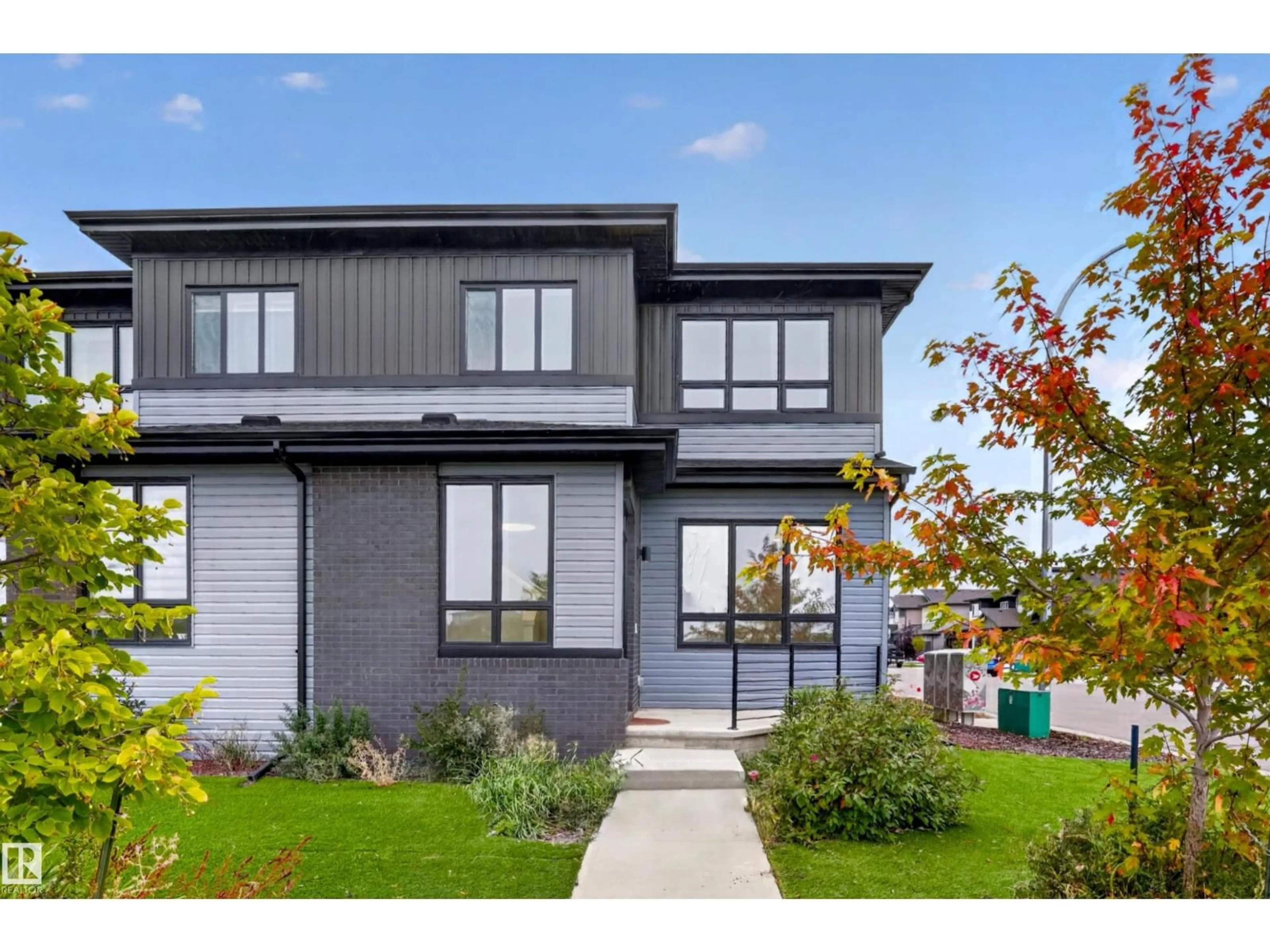 Home with vinyl exterior material, street for 105 GREENFIELD LI, Fort Saskatchewan Alberta T8L0X9