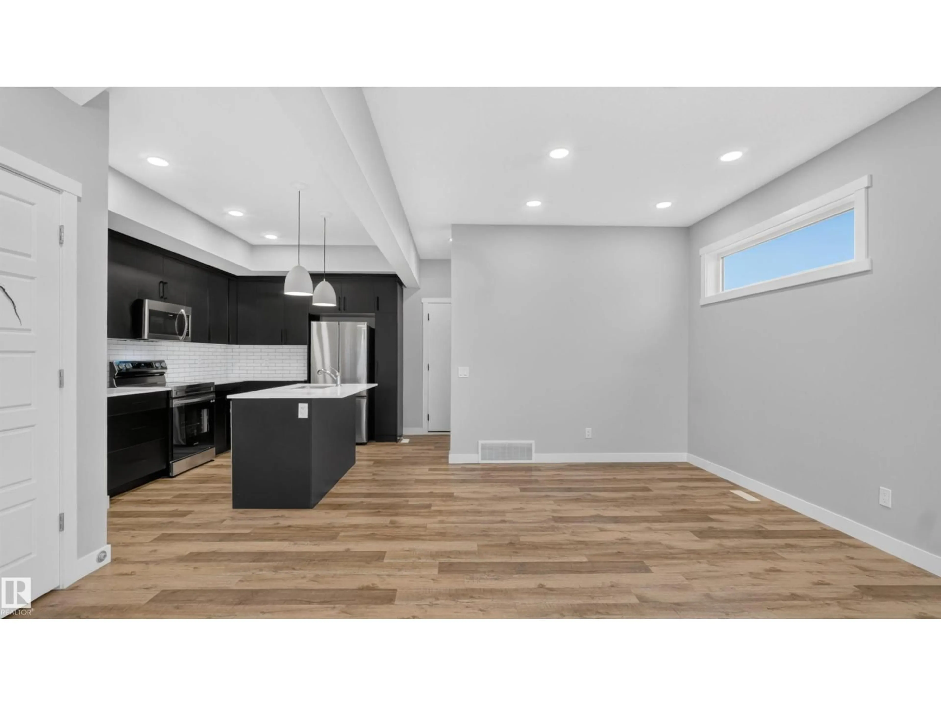 Open concept kitchen, unknown for 105 GREENFIELD LI, Fort Saskatchewan Alberta T8L0X9