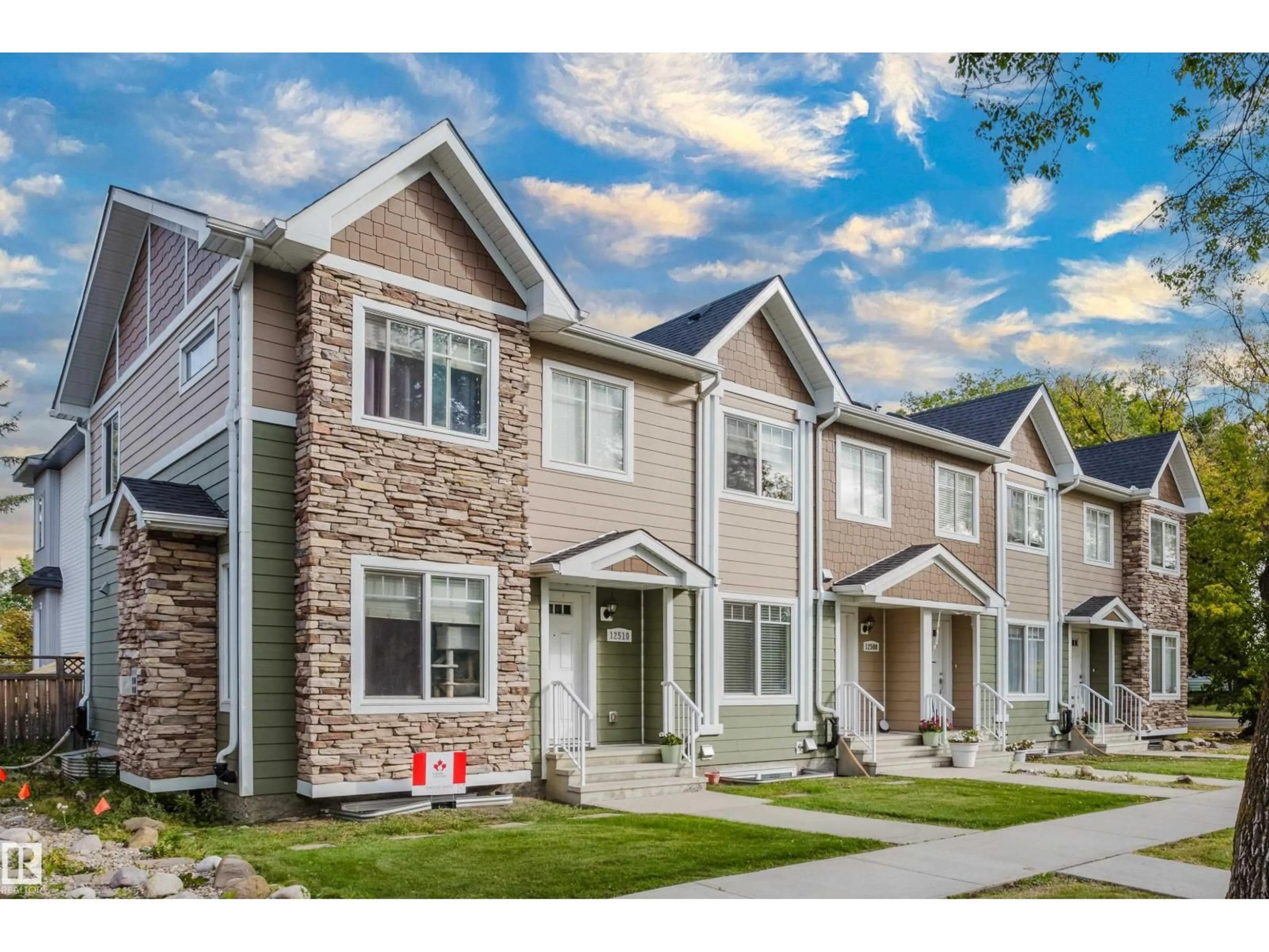 Home with vinyl exterior material, street for NW - 12504-12510 119 AV, Edmonton Alberta T5L2Z5