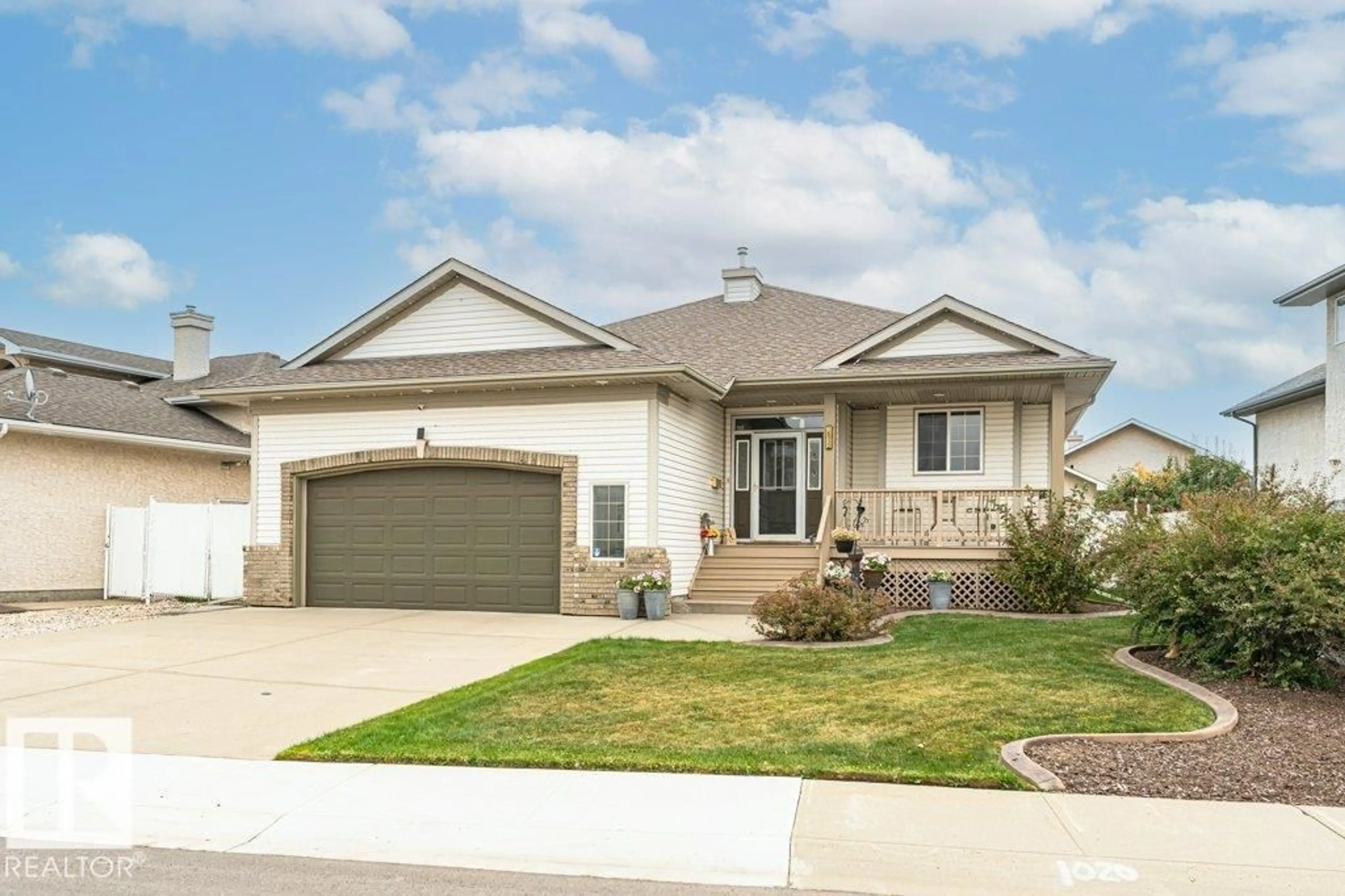 Home with vinyl exterior material, street for 16532 75 ST, Edmonton Alberta T5Z3R1