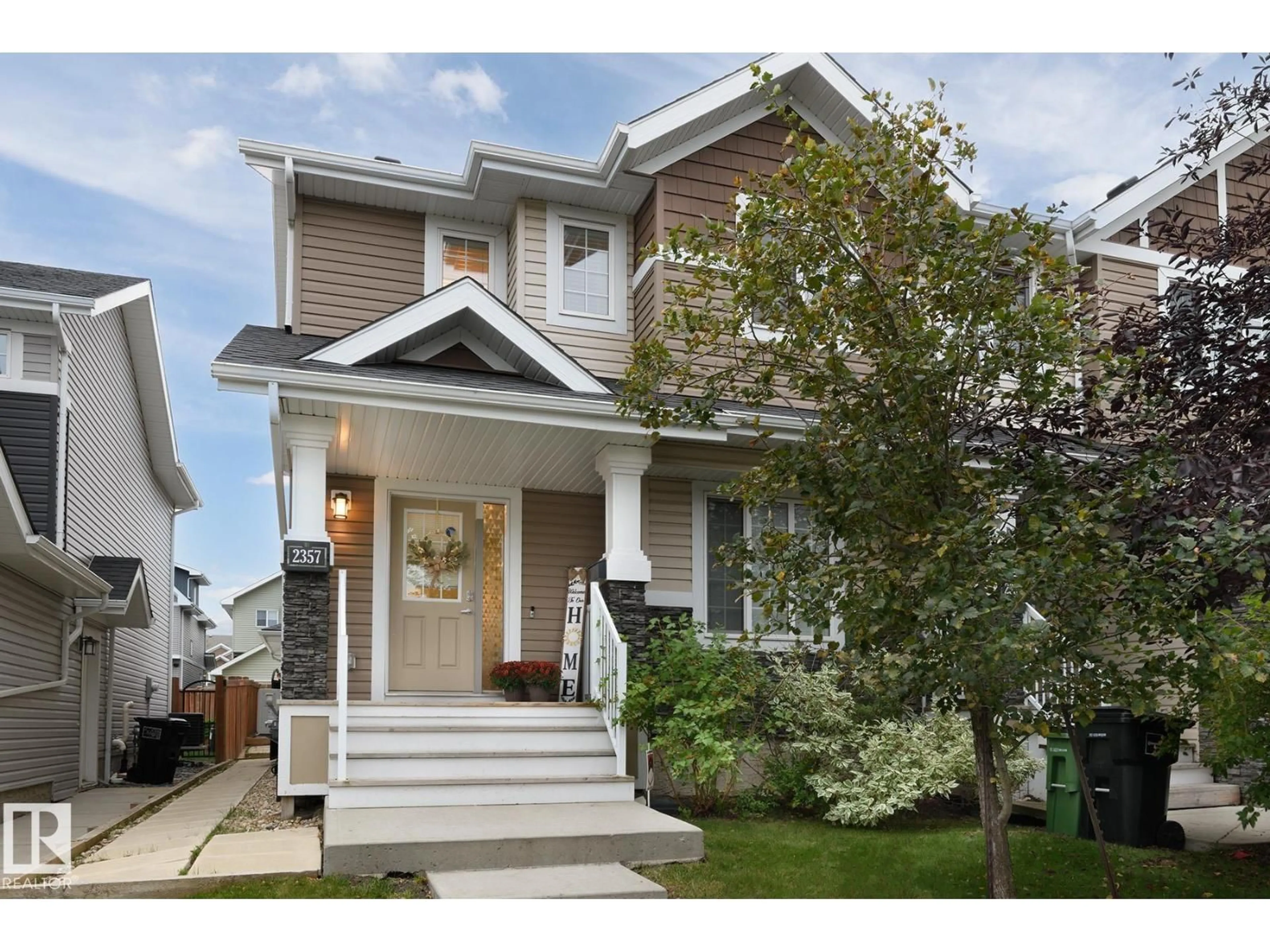 Home with vinyl exterior material, street for 2357 GLENRIDDING BV, Edmonton Alberta T6W2T2