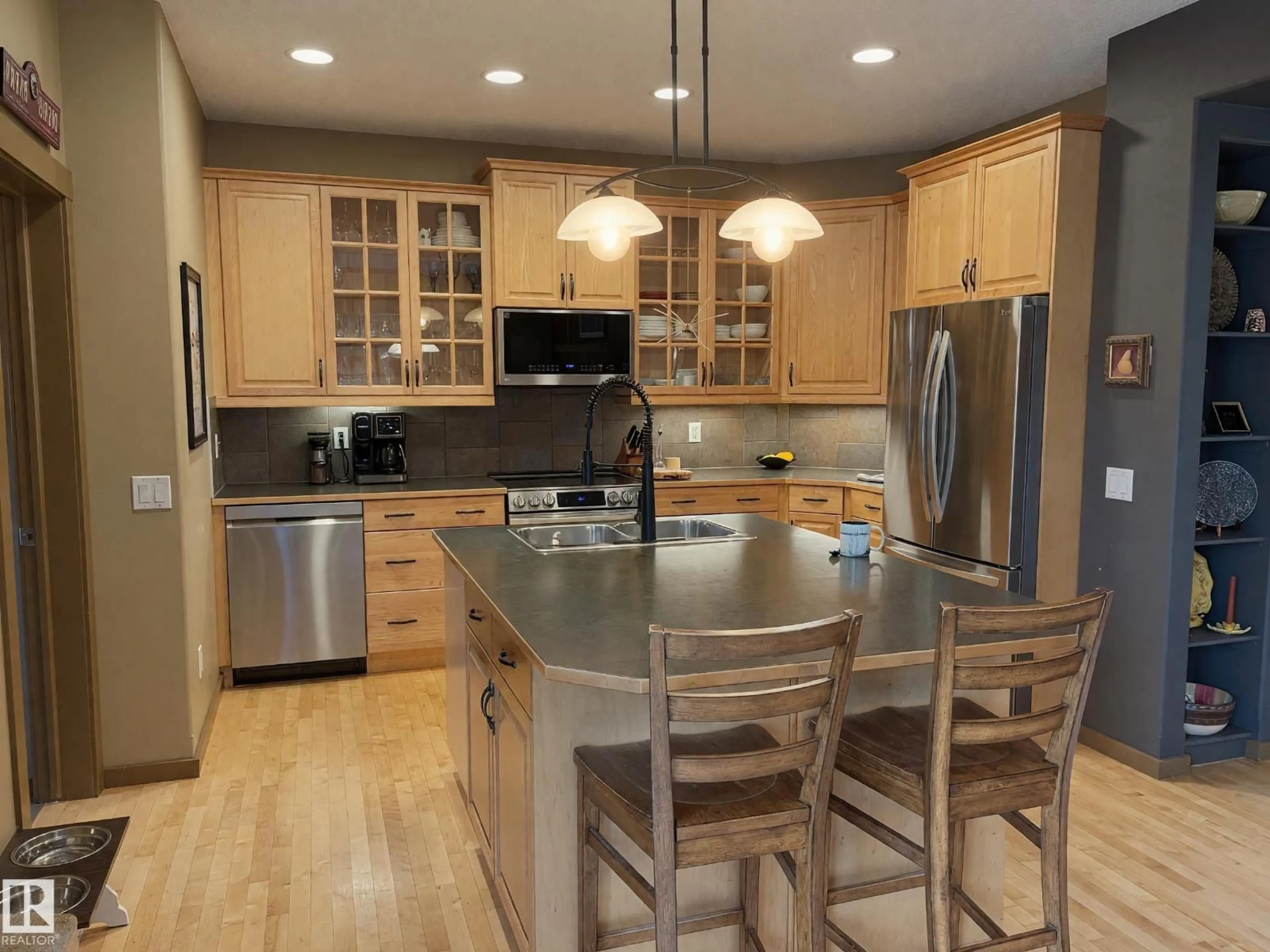 Contemporary kitchen, wood/laminate floor for 1205 COLONEL STONE AV, Edmonton Alberta T5E0E4