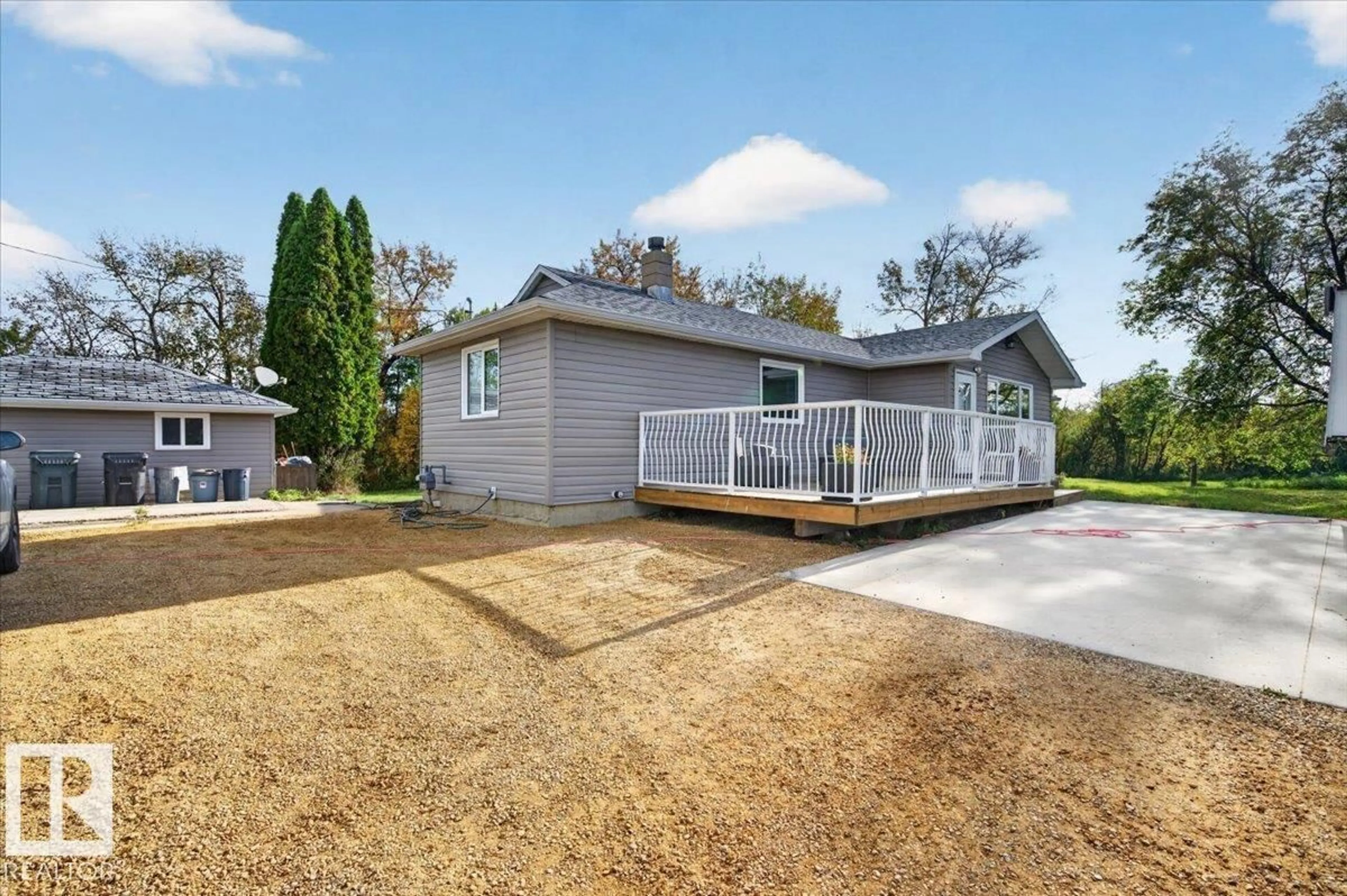 Home with vinyl exterior material, street for 53203 RR 220, Rural Strathcona County Alberta T8E2B5