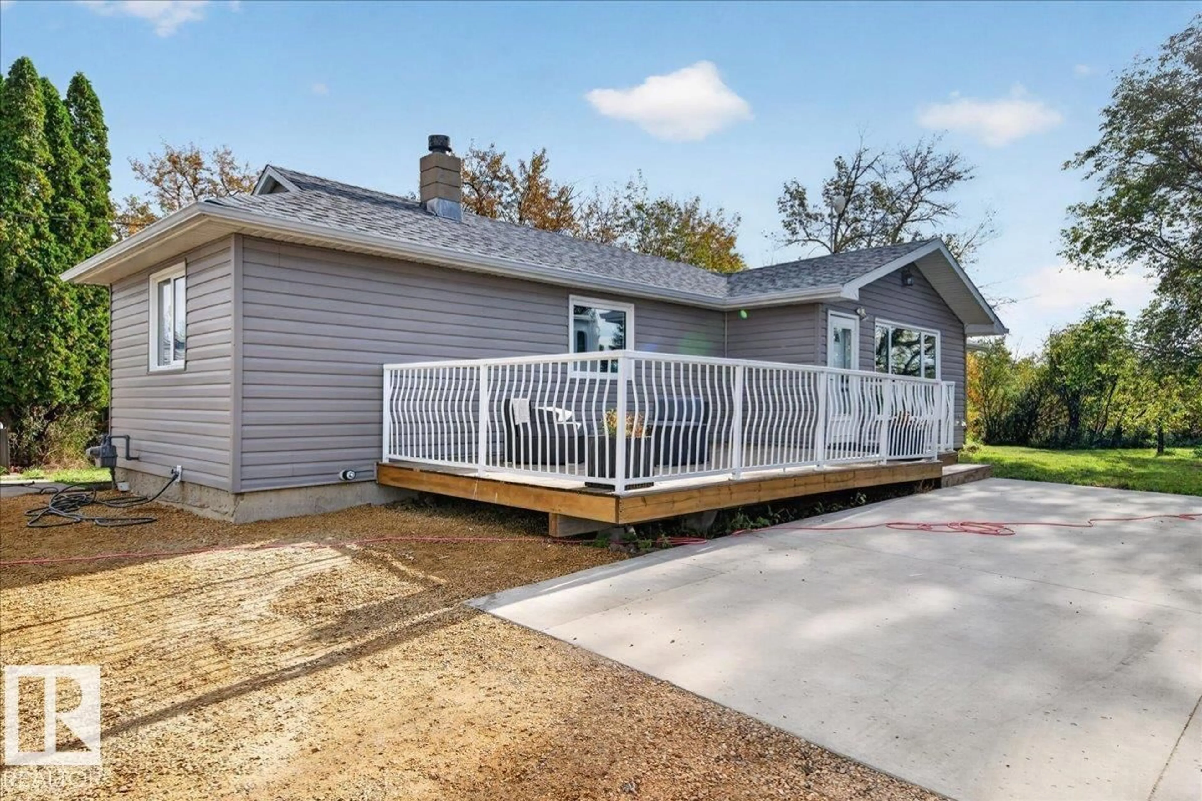 Home with vinyl exterior material, street for 53203 RR 220, Rural Strathcona County Alberta T8E2B5
