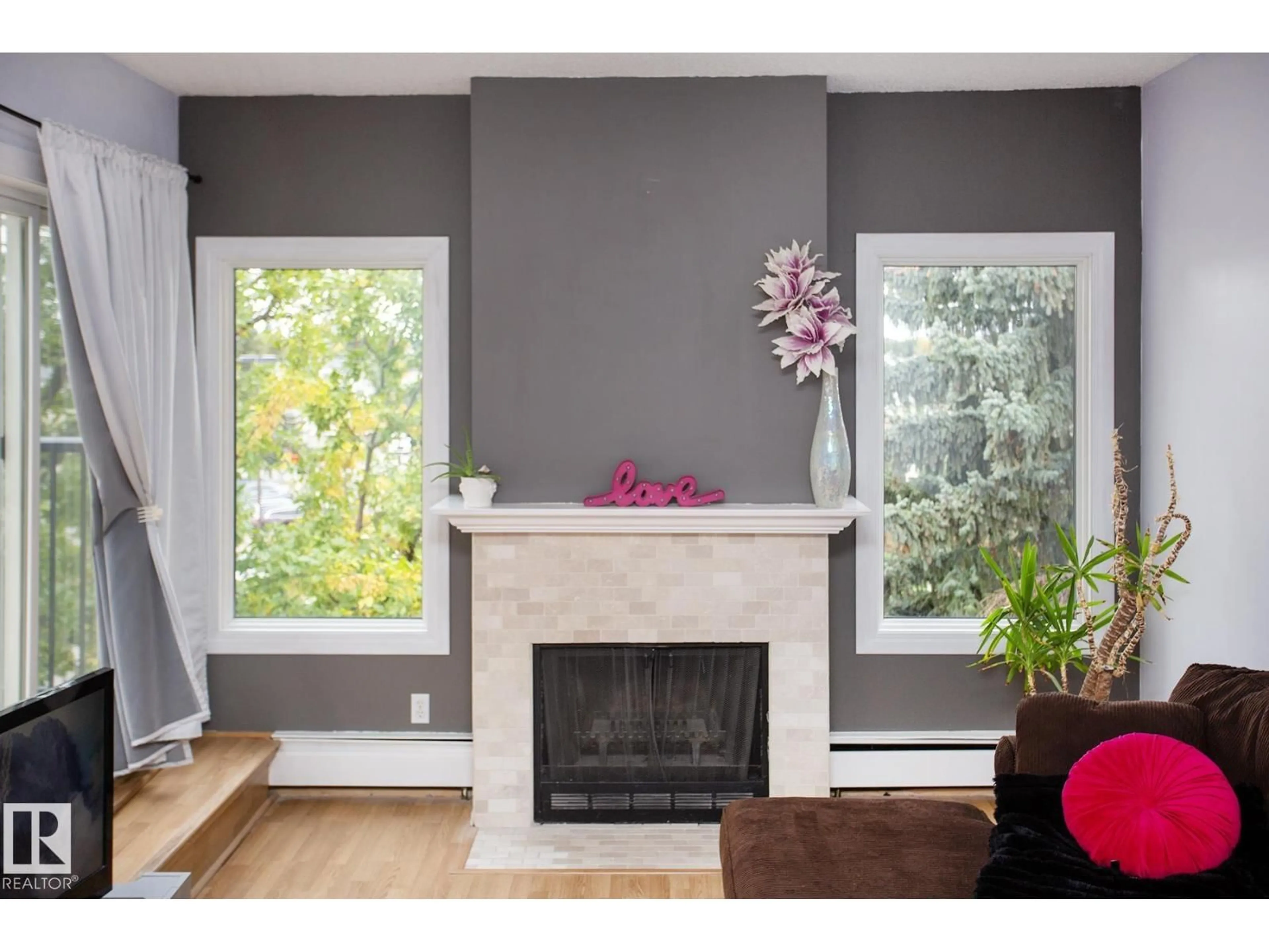 Living room with furniture, wood/laminate floor for #407 - 9810 178 ST NW, Edmonton Alberta T5T3H4