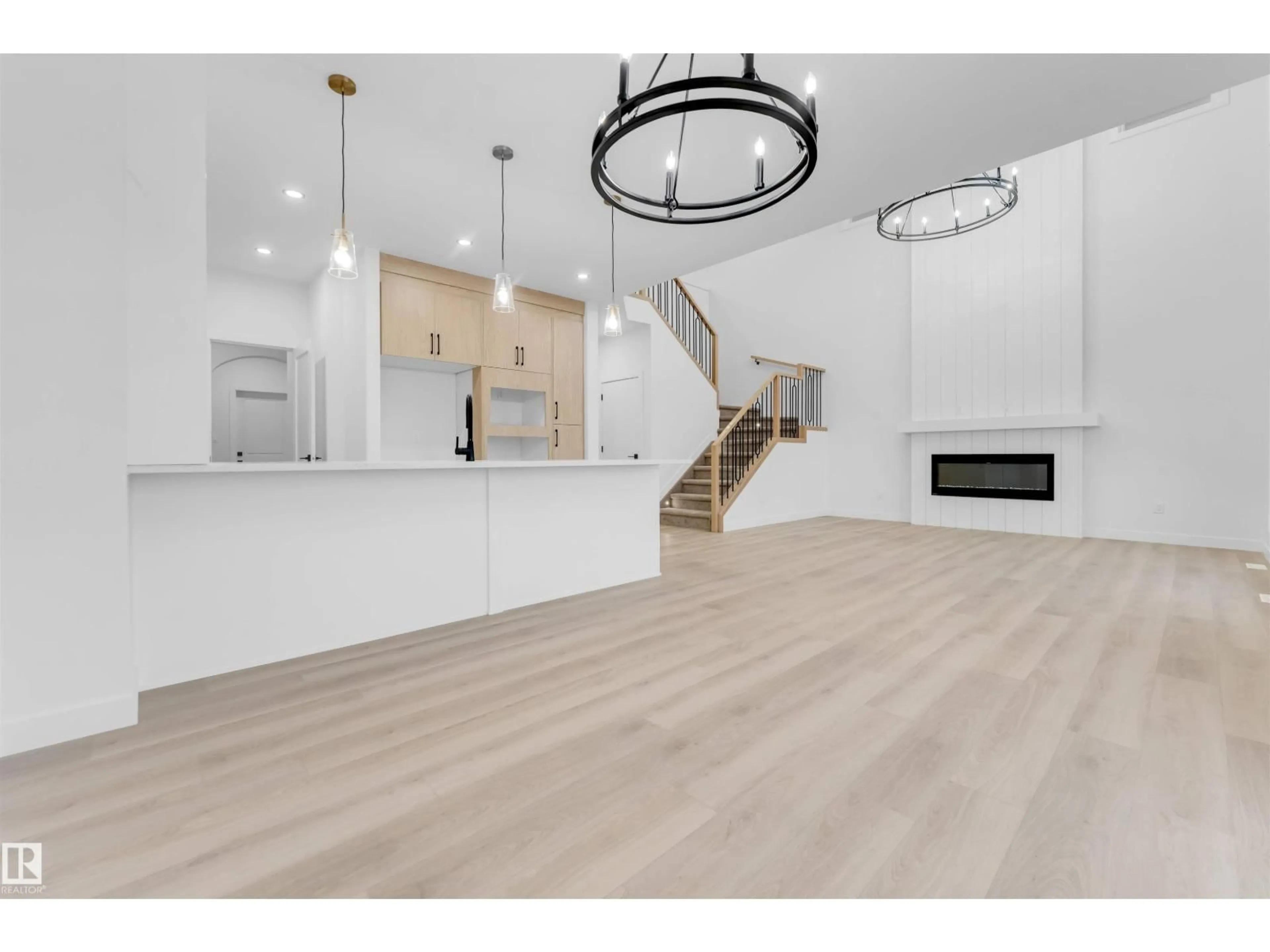 Open concept kitchen, wood/laminate floor for 517 ASHGROVE CI, Leduc Alberta T9E0K8