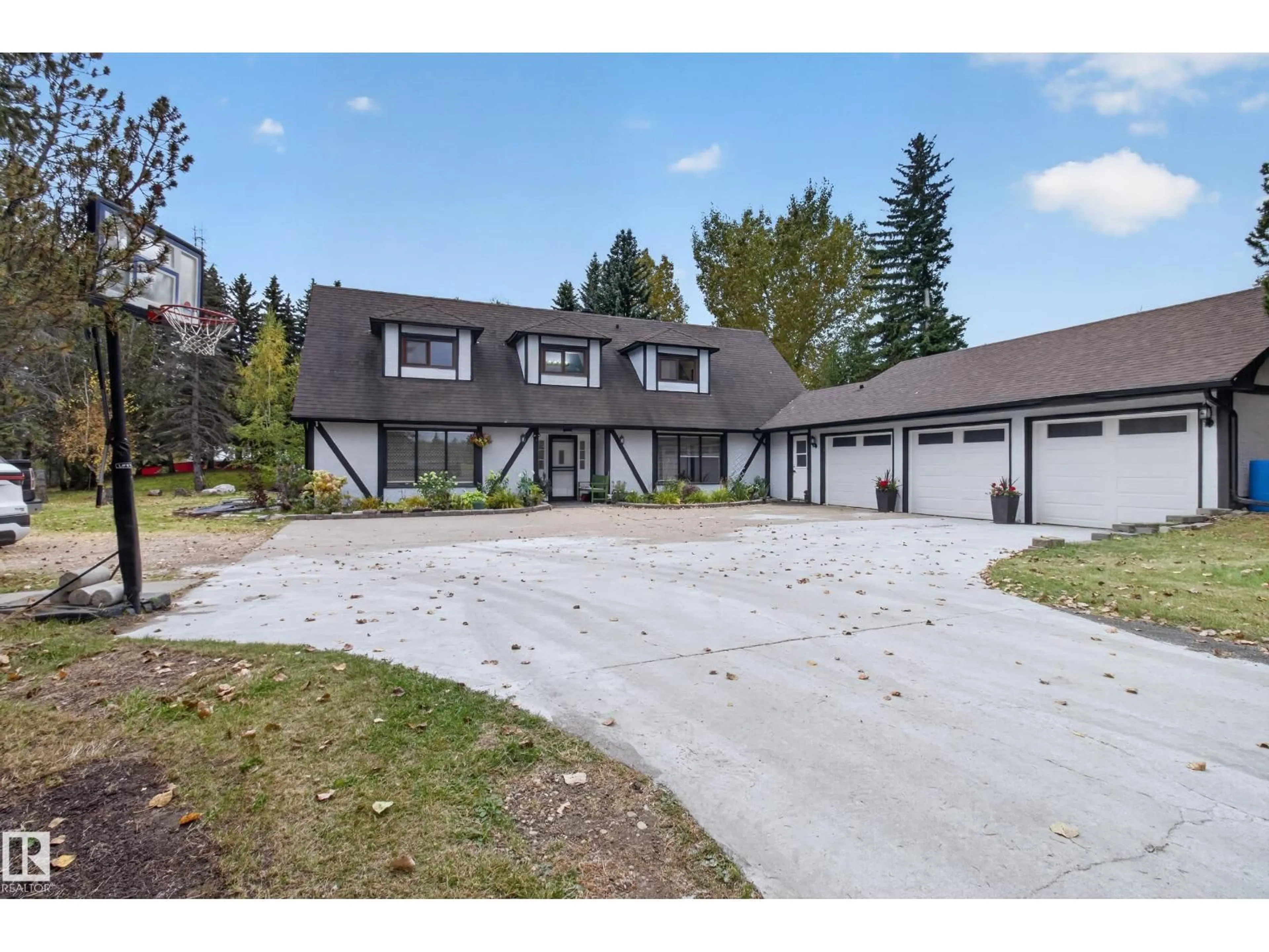A pic from outside/outdoor area/front of a property/back of a property/a pic from drone, street for 52328 HWY 21, Rural Strathcona County Alberta T8B1J9