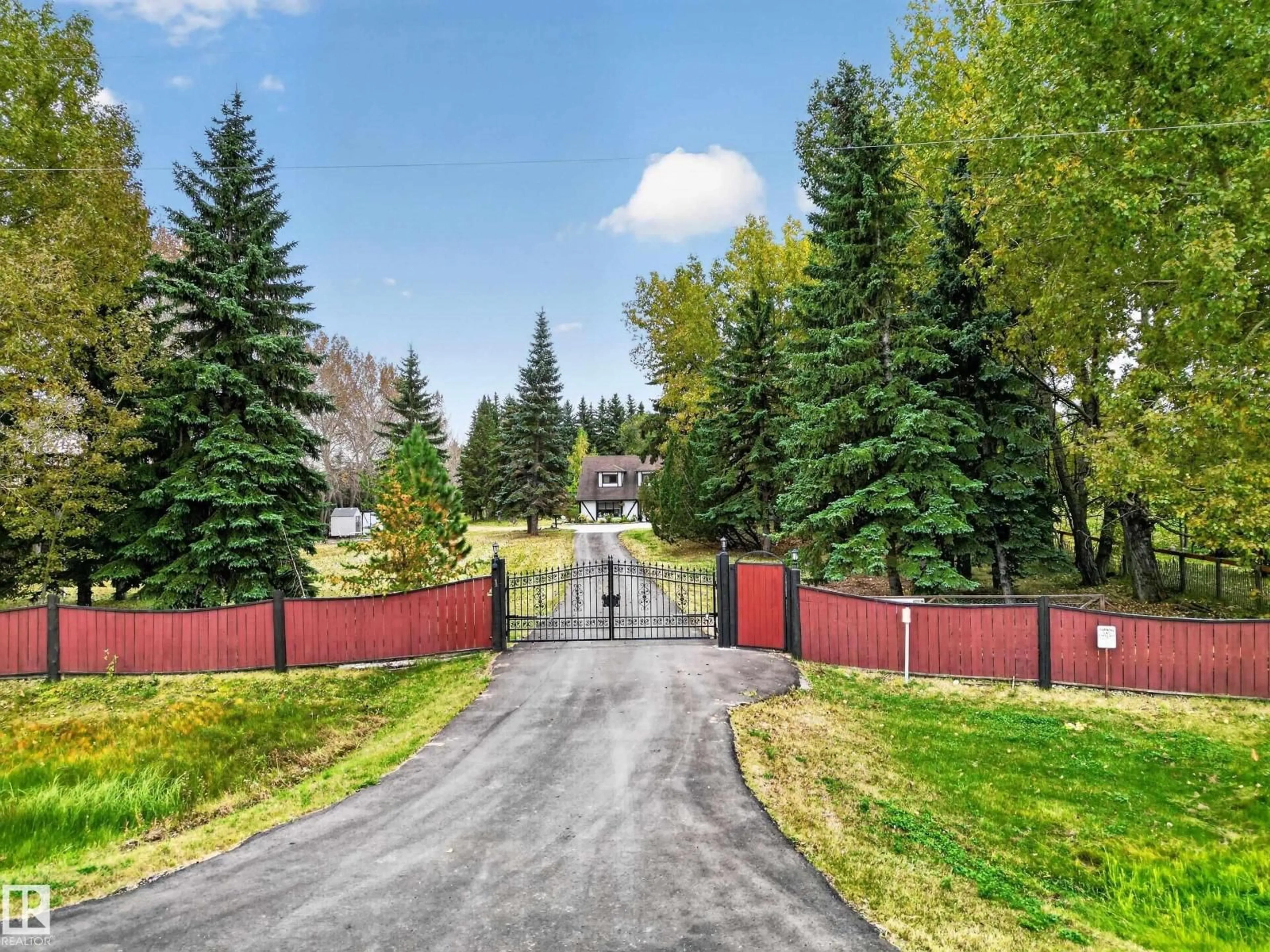 A pic from outside/outdoor area/front of a property/back of a property/a pic from drone, street for 52328 HWY 21, Rural Strathcona County Alberta T8B1J9