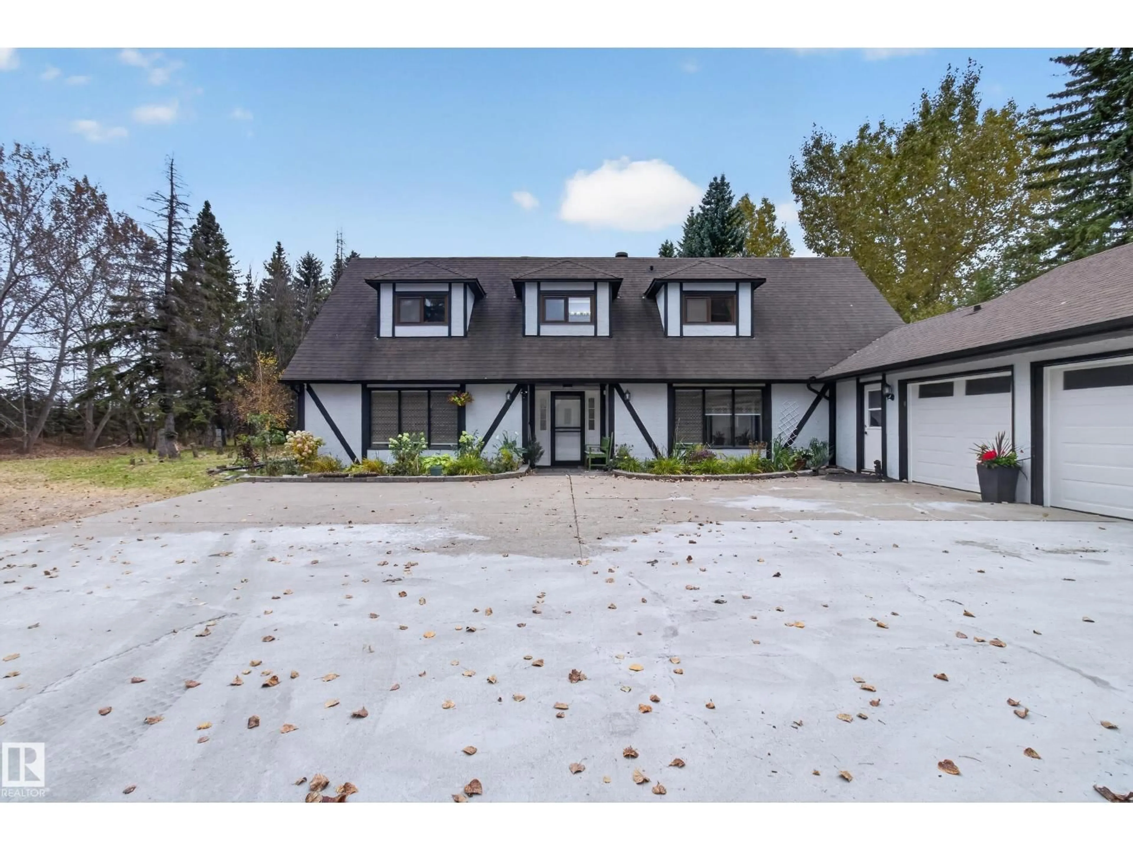 Home with vinyl exterior material, street for 52328 HWY 21, Rural Strathcona County Alberta T8B1J9
