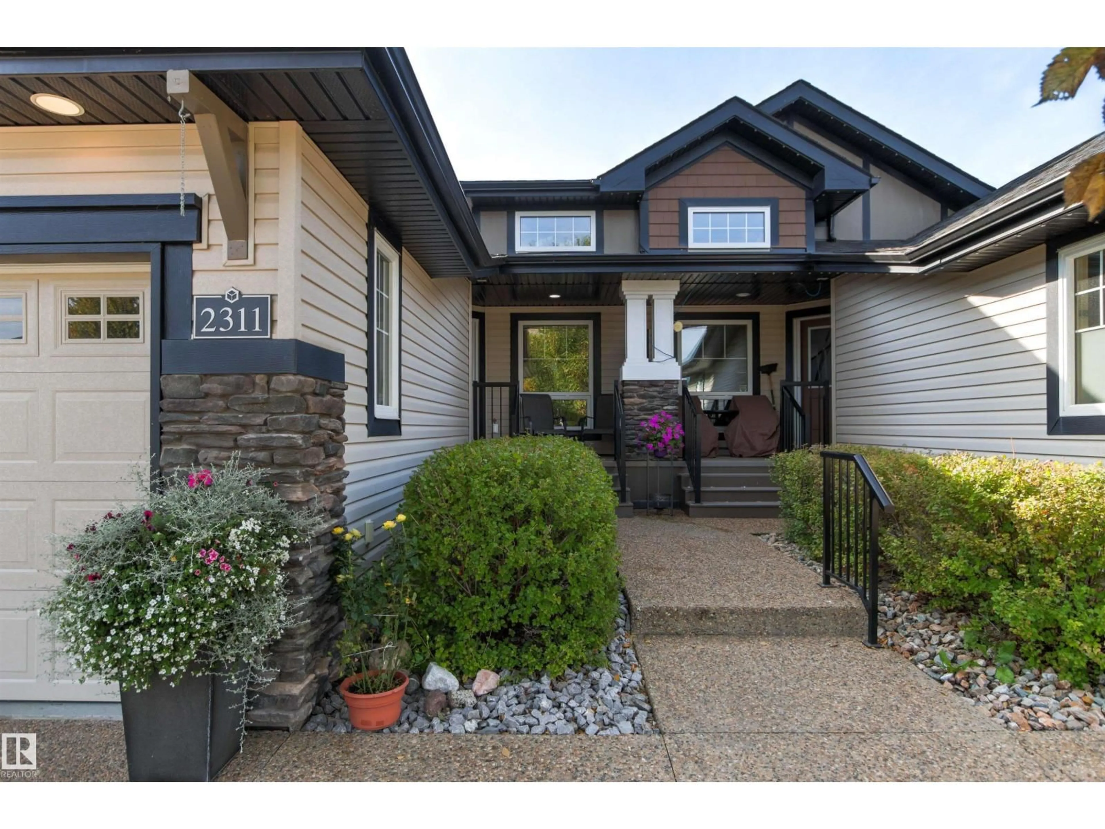 Home with brick exterior material, street for 2311 ASHCRAFT SW, Edmonton Alberta T6W2J1