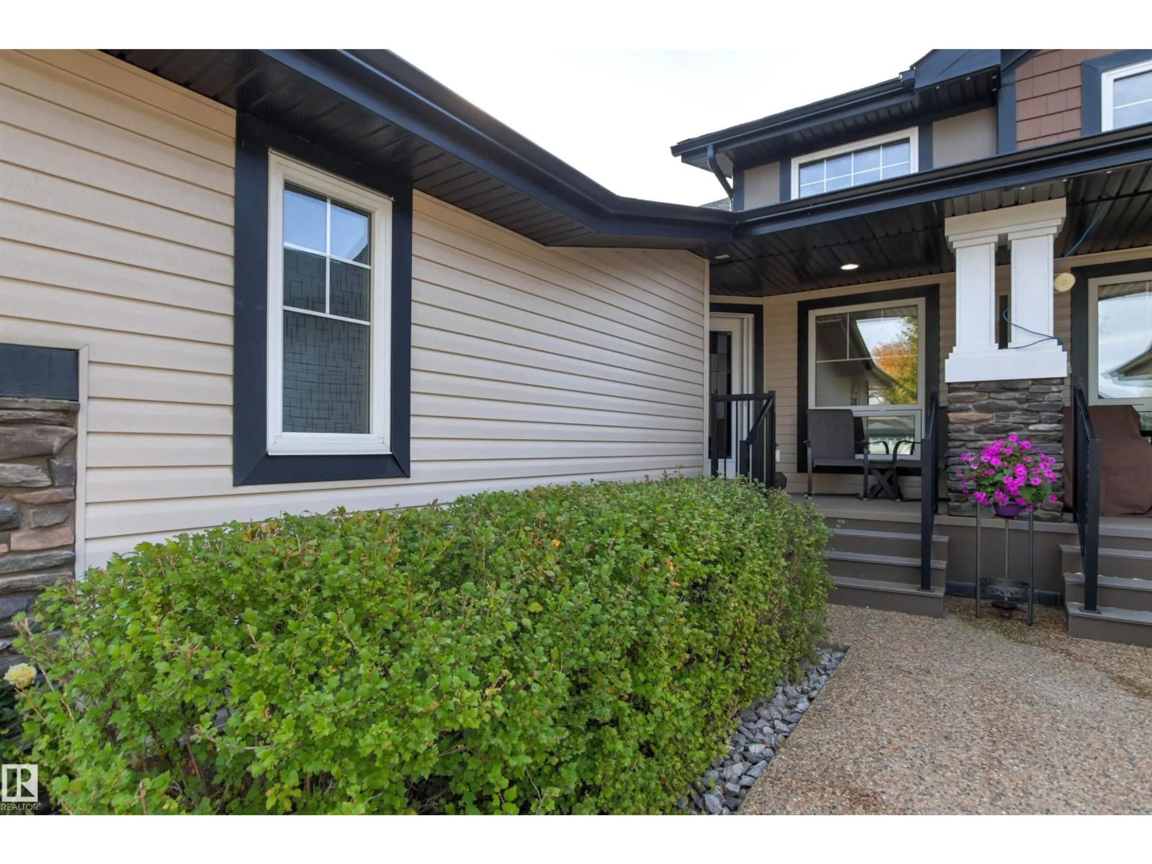 Home with vinyl exterior material, street for 2311 ASHCRAFT SW, Edmonton Alberta T6W2J1