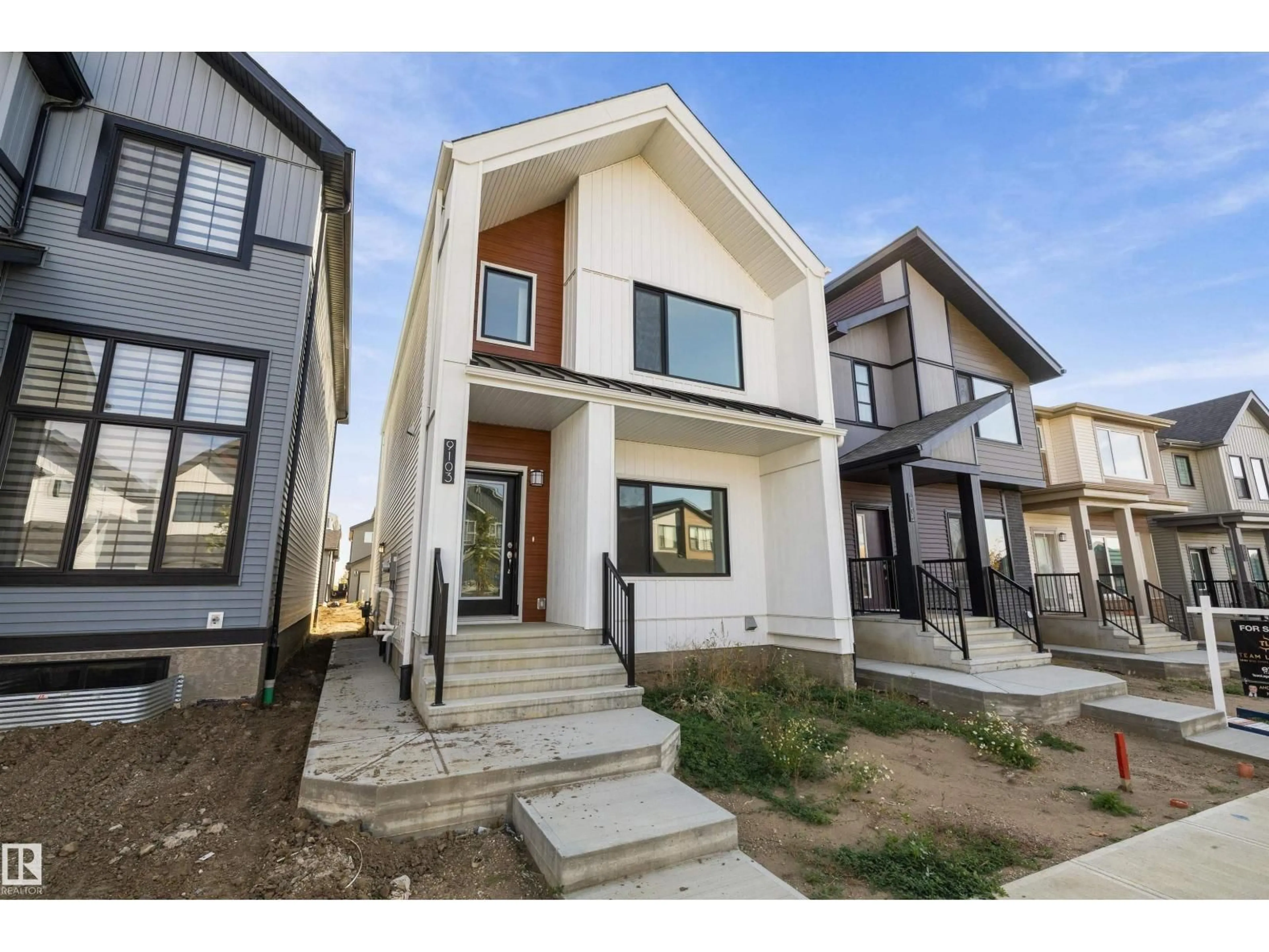 Home with vinyl exterior material, street for 9103 ELVES LO, Edmonton Alberta T6M3G2