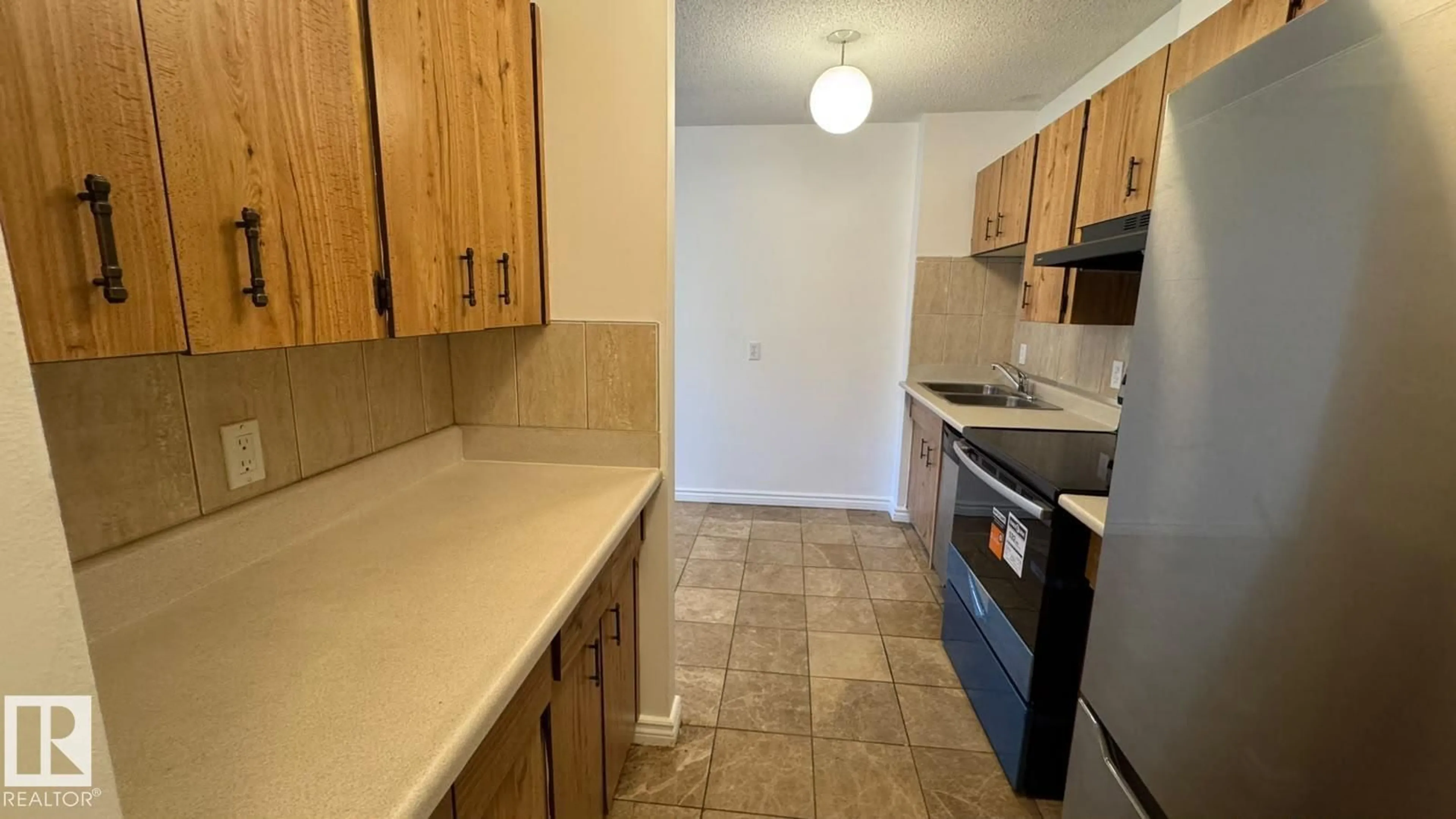 Standard kitchen, unknown for #108 - 10175 114 ST, Edmonton Alberta T5K2L4