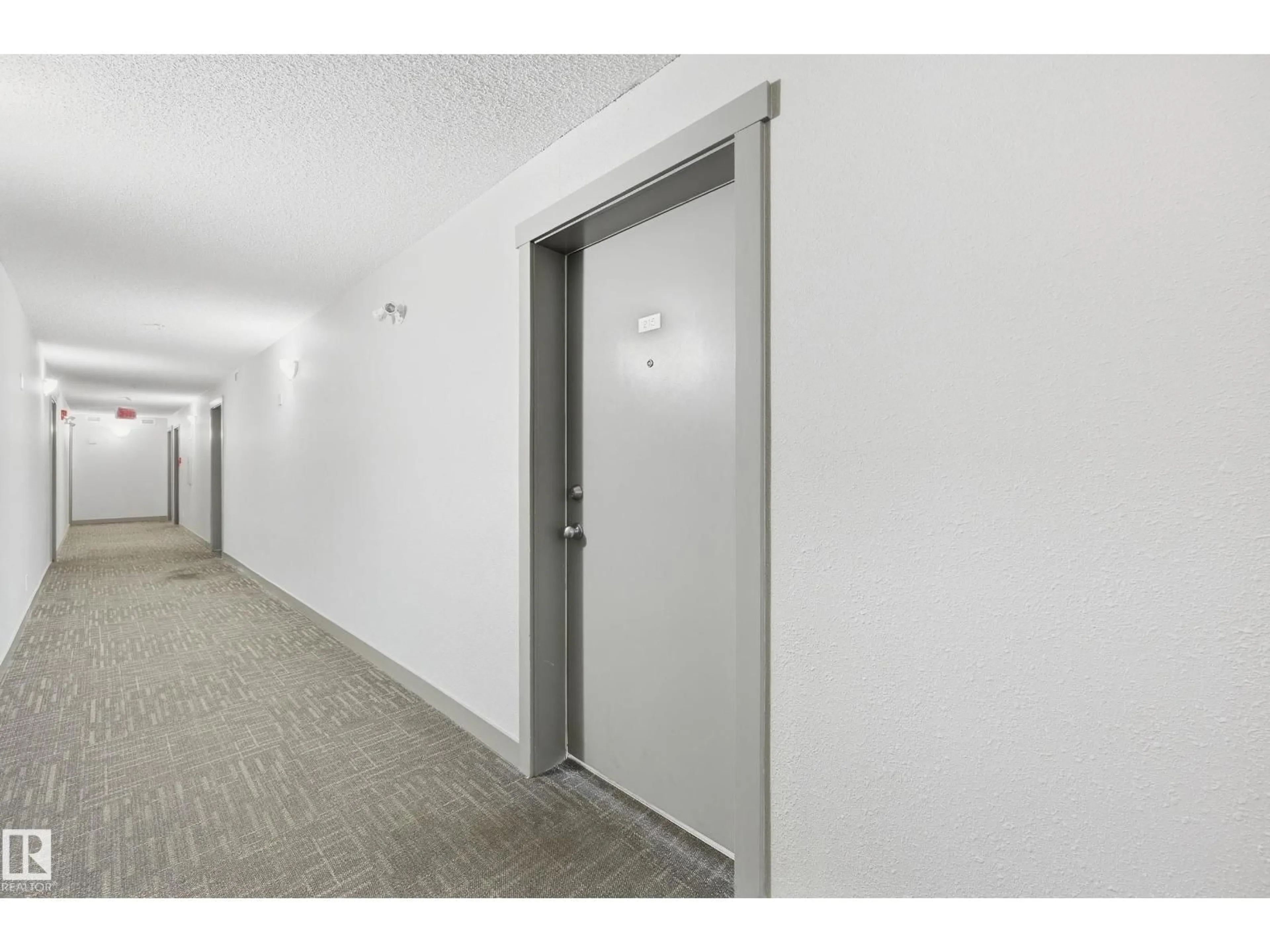 Indoor foyer for #215 - 11804 22 AV, Edmonton Alberta T6W2A2