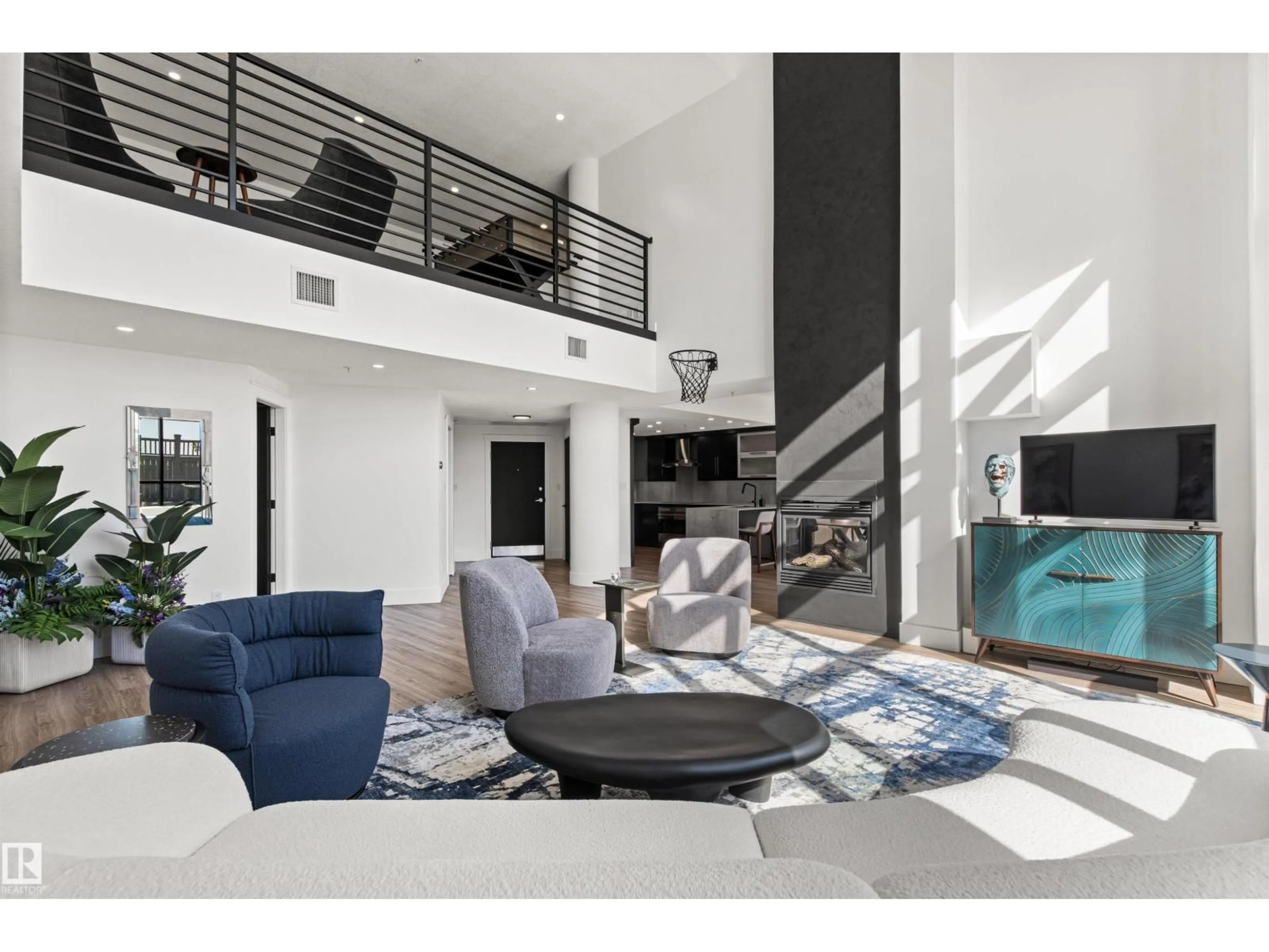 Living room with furniture, unknown for #106 - 9020 JASPER AV, Edmonton Alberta T5H3S8