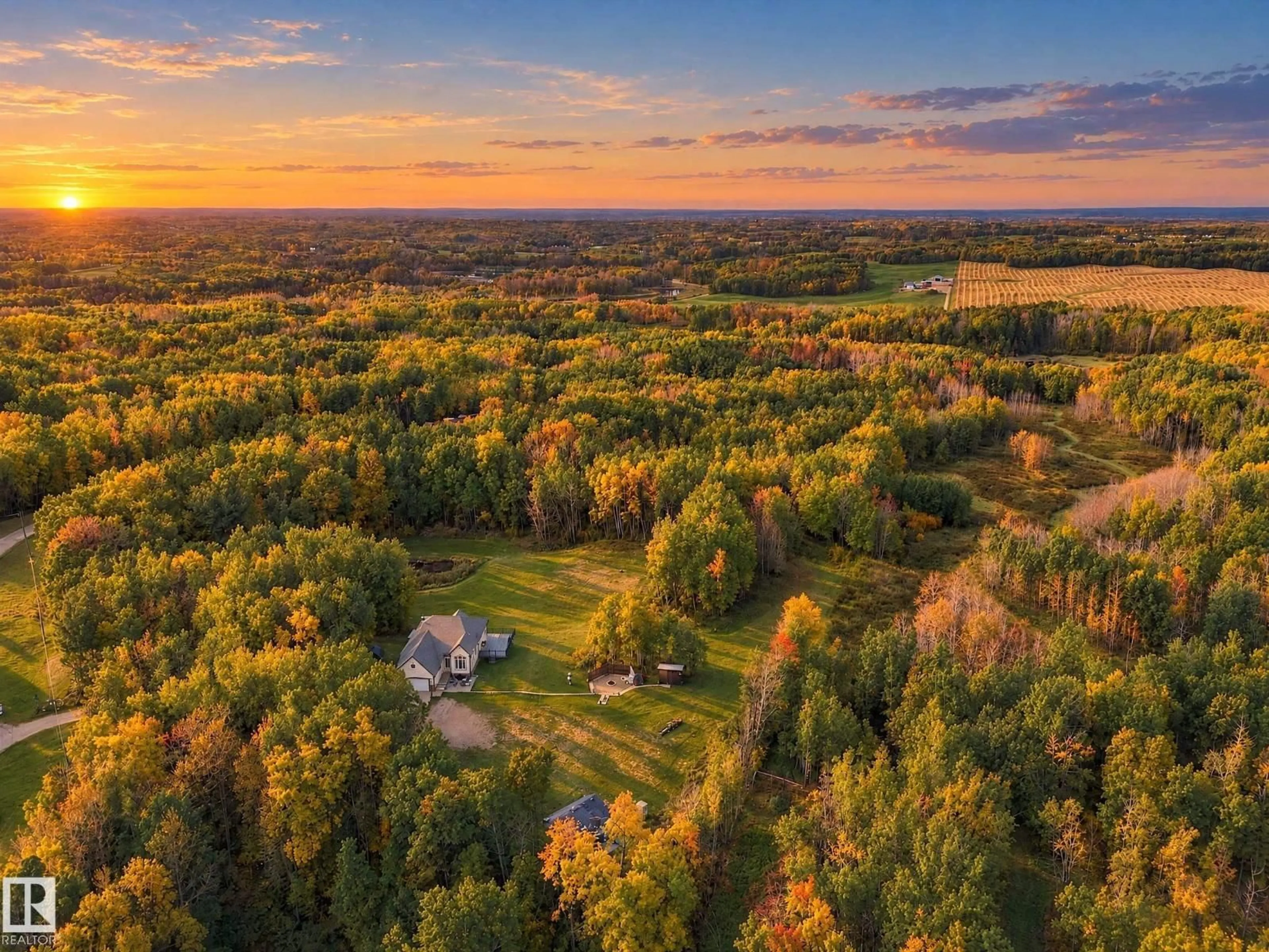 A pic from outside/outdoor area/front of a property/back of a property/a pic from drone, forest/trees view for #7 - 54020 HGHWAY 779, Rural Parkland County Alberta T7Y0A3