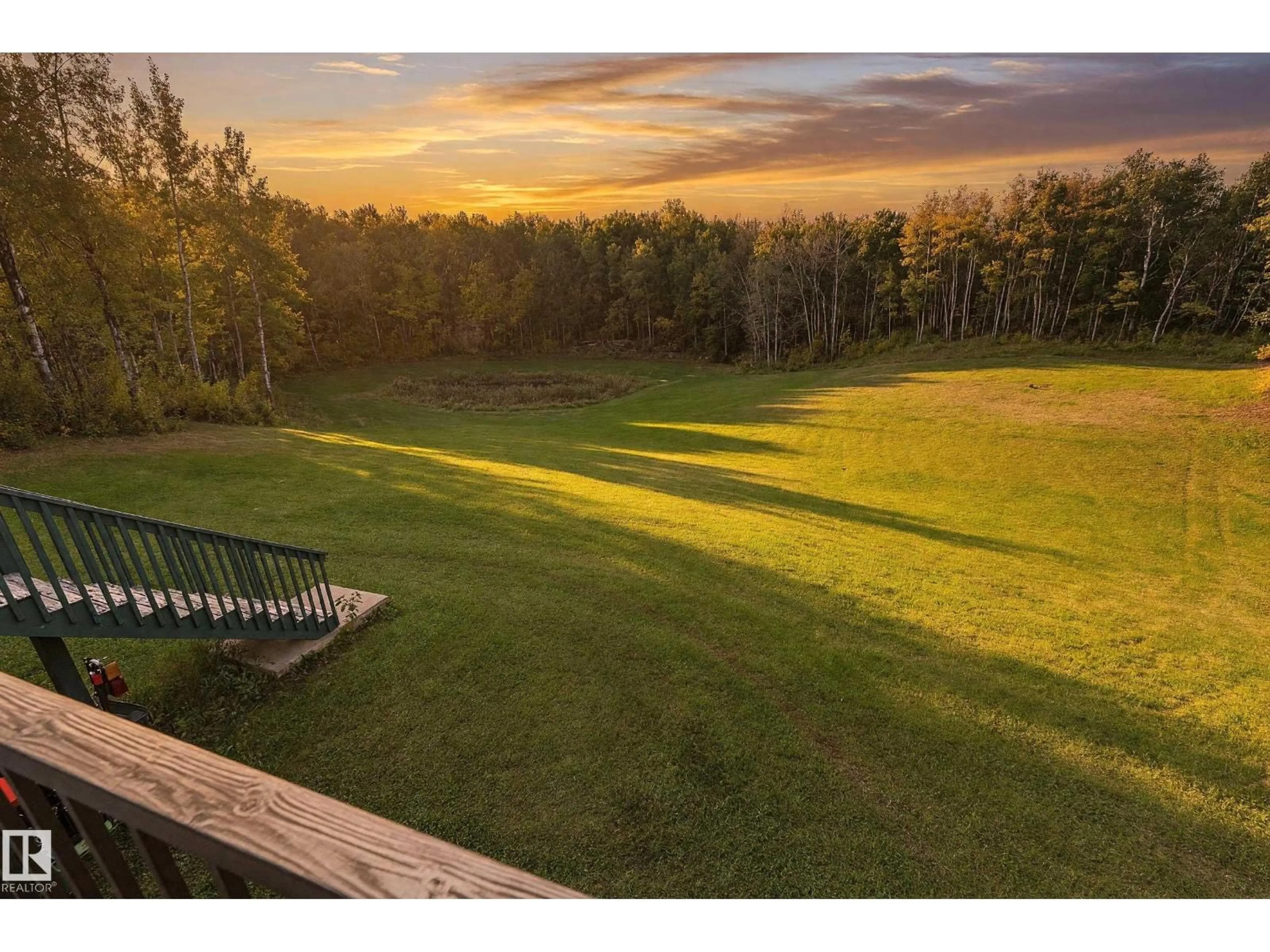 A pic from outside/outdoor area/front of a property/back of a property/a pic from drone, forest/trees view for #7 - 54020 HGHWAY 779, Rural Parkland County Alberta T7Y0A3