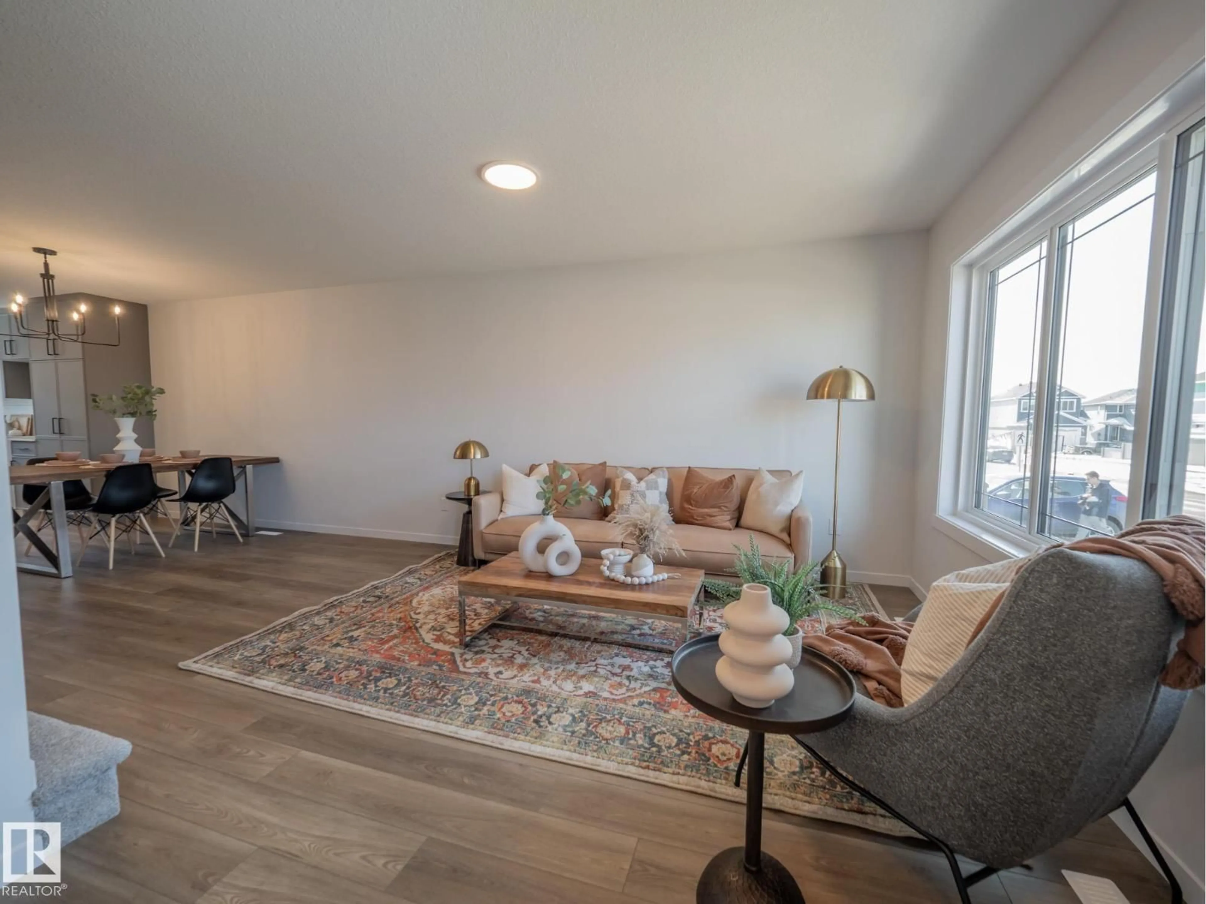 Living room with furniture, wood/laminate floor for 5224 SCHONSEE DR, Edmonton Alberta T5Z0M5