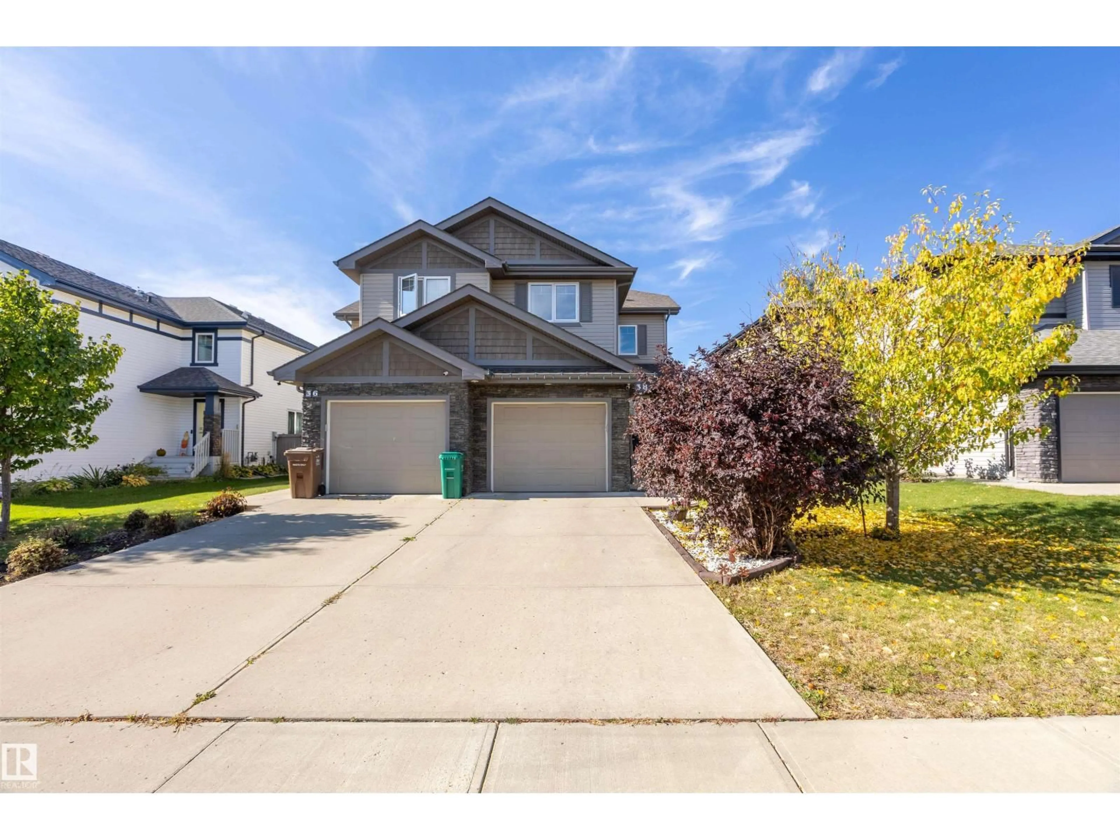Home with vinyl exterior material, street for 38 RED TAIL WY, St. Albert Alberta T8N7N7