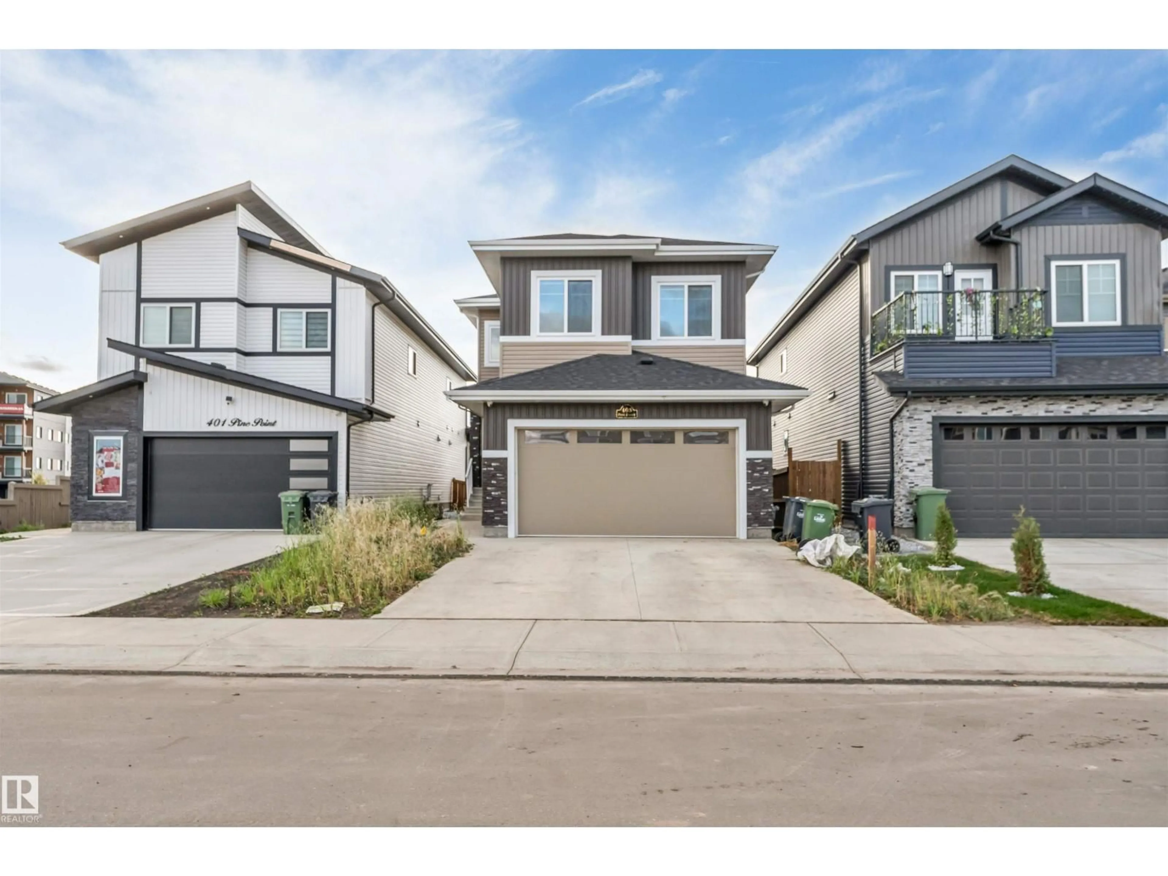 Home with vinyl exterior material, street for 403 PINE POINT, Leduc Alberta T9E1S7