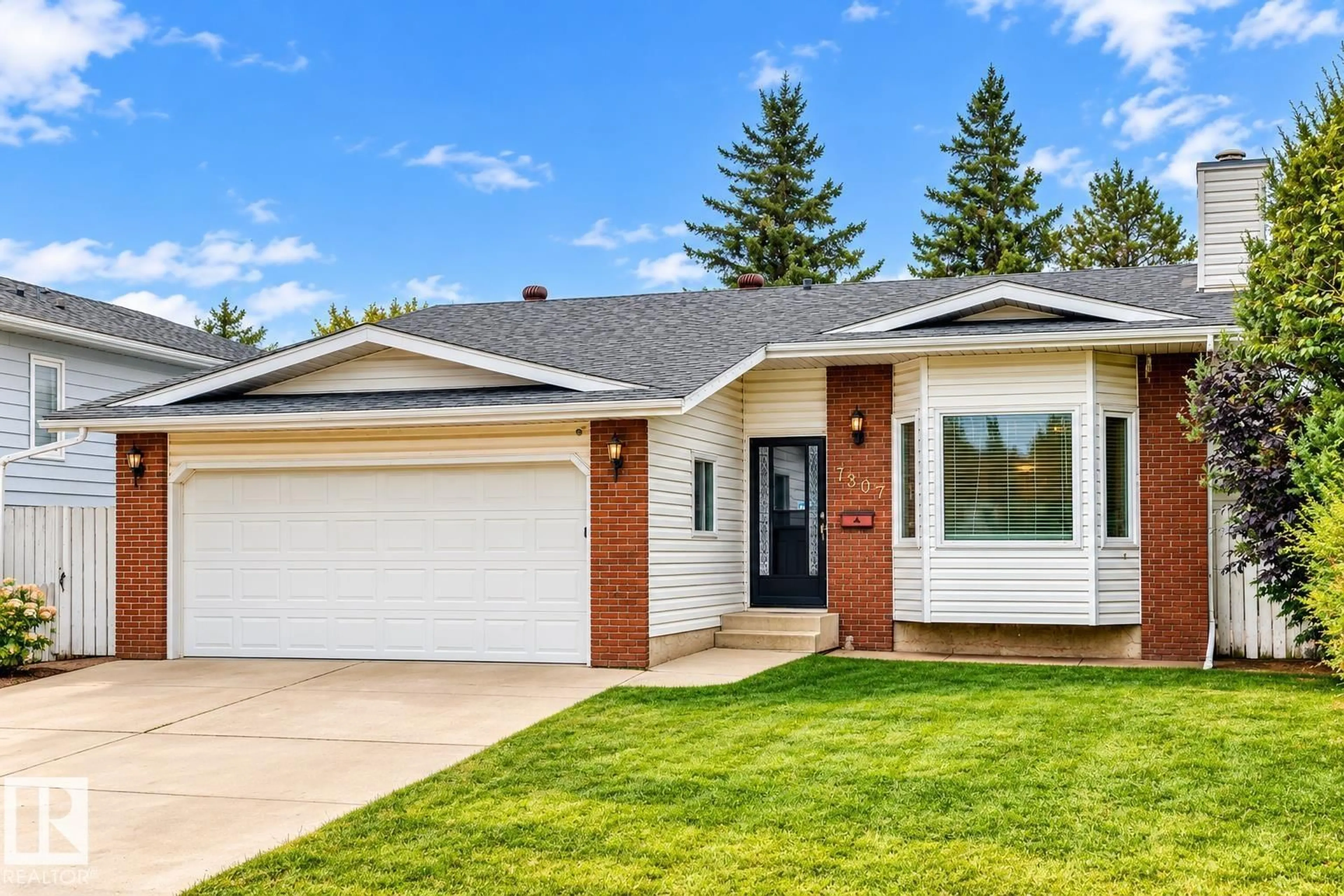 Home with vinyl exterior material, street for NW - 7307 152C AV, Edmonton Alberta T5C3N3