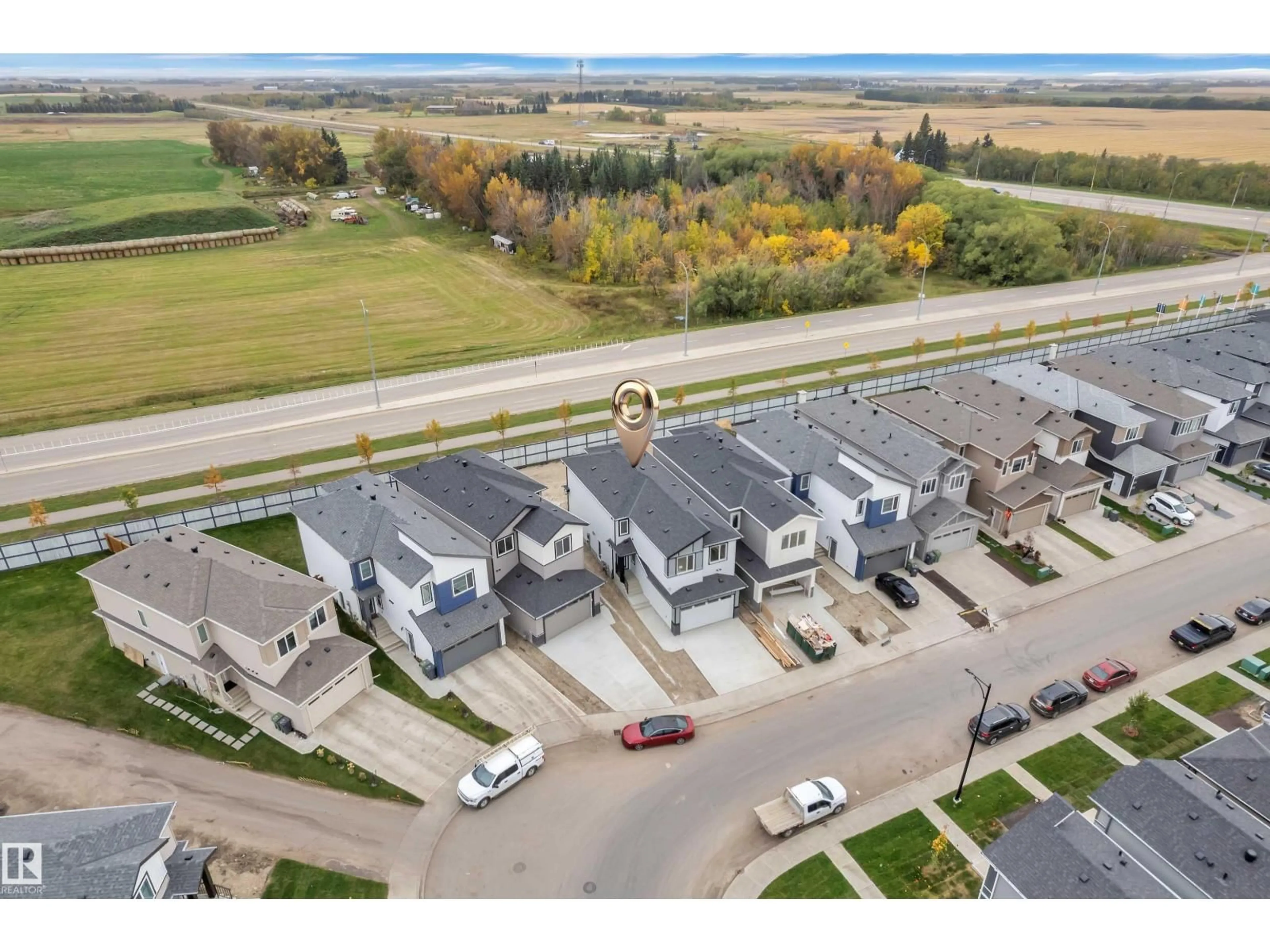 A pic from outside/outdoor area/front of a property/back of a property/a pic from drone, street for 292 MUNN WAY, Leduc Alberta T9E1V1