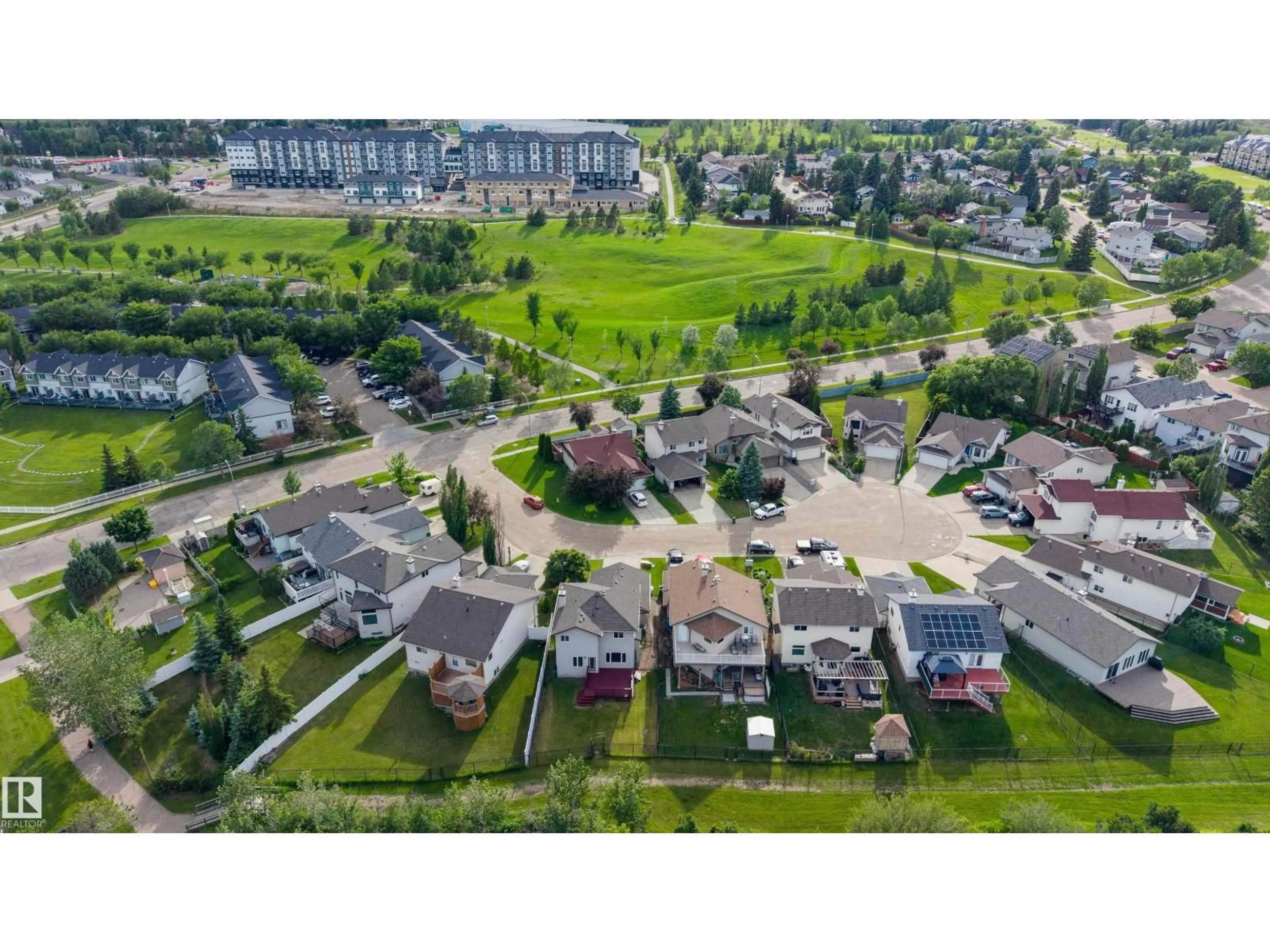 A pic from outside/outdoor area/front of a property/back of a property/a pic from drone, street for NW - 611 HOOKE CO, Edmonton Alberta T5A5H5