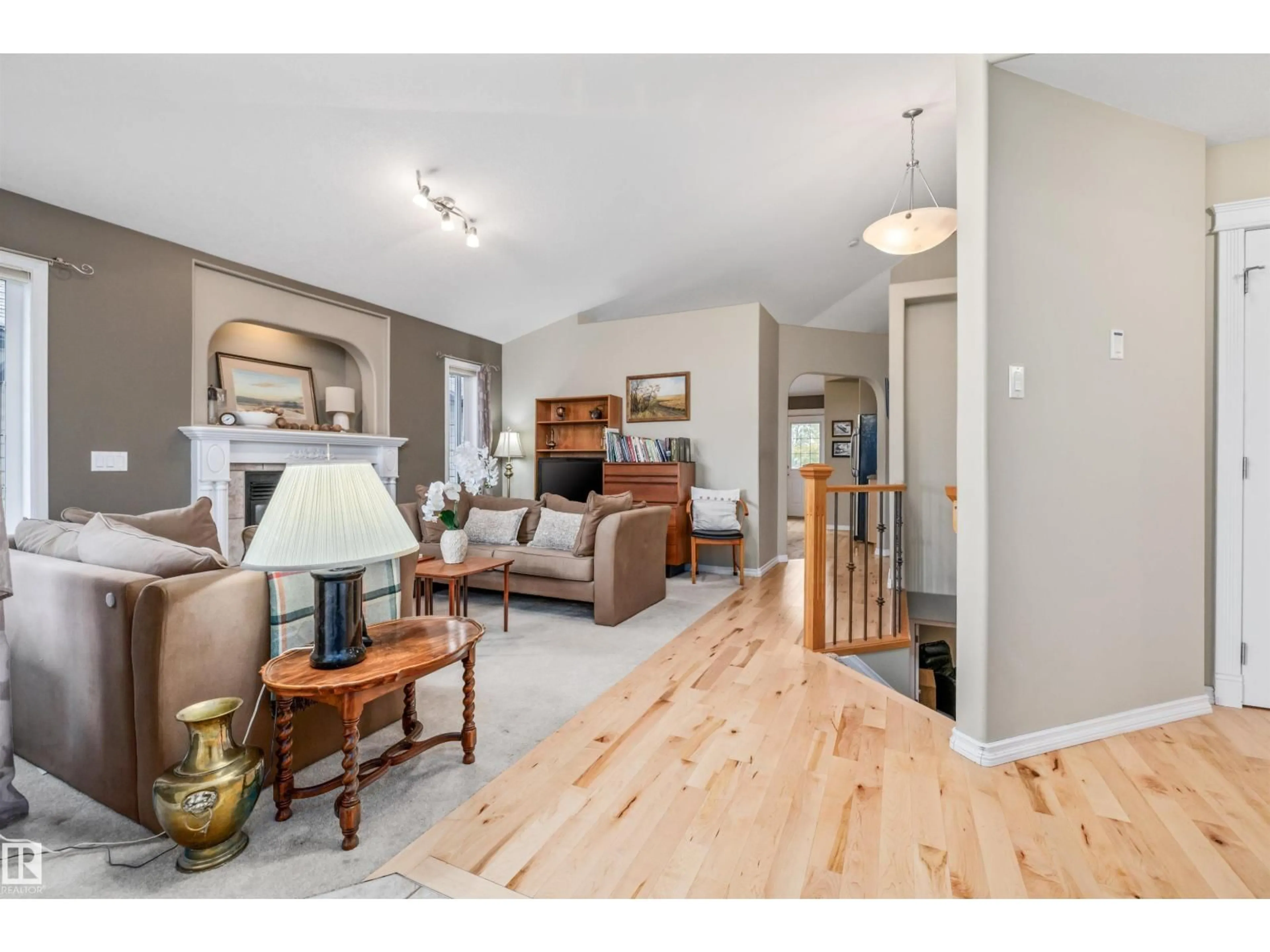 Living room with furniture, wood/laminate floor for 20 HARVARD PLACE, Spruce Grove Alberta T7X4K8