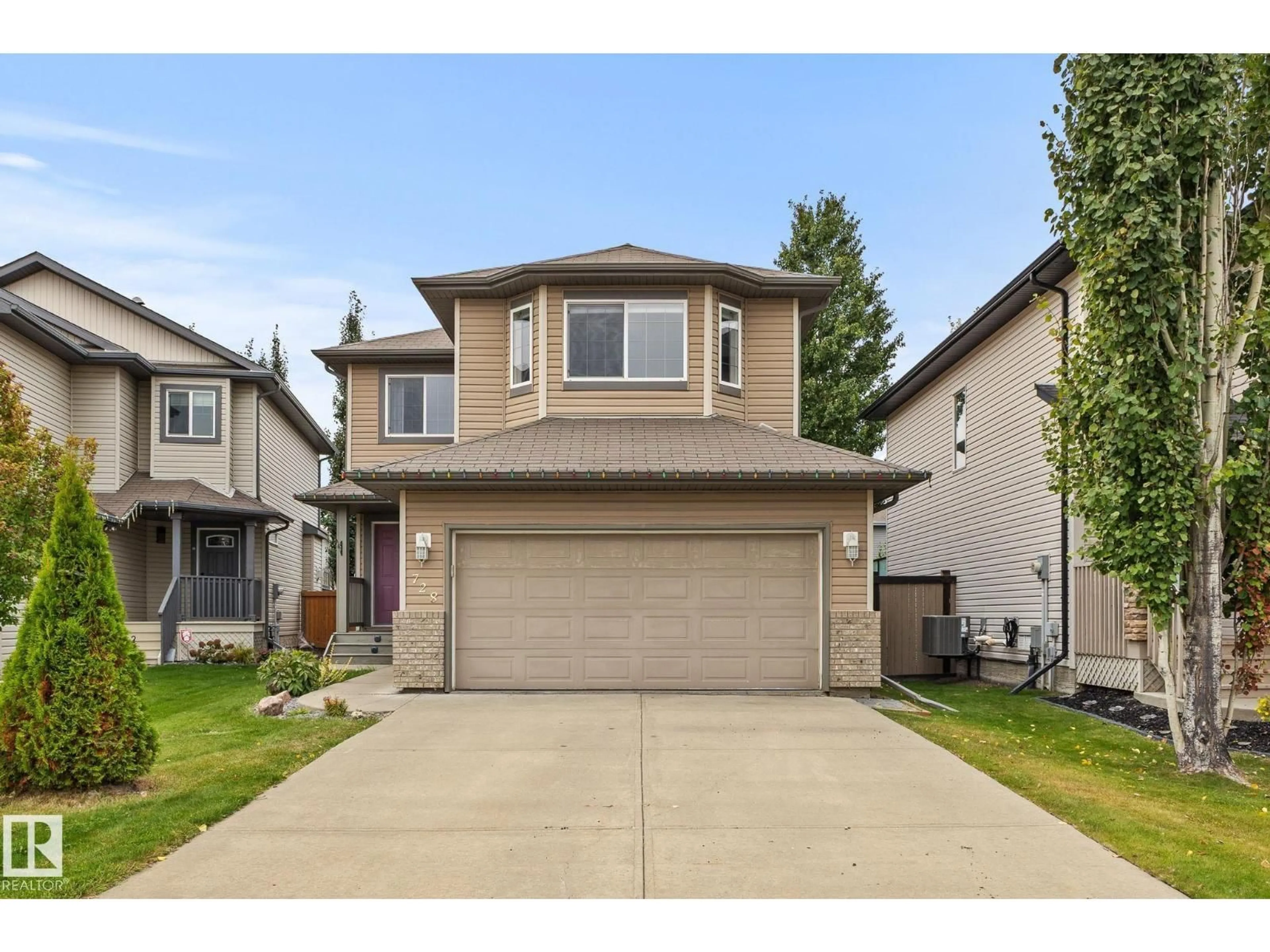Home with vinyl exterior material, street for SW - 728 173 ST, Edmonton Alberta T6W0M4