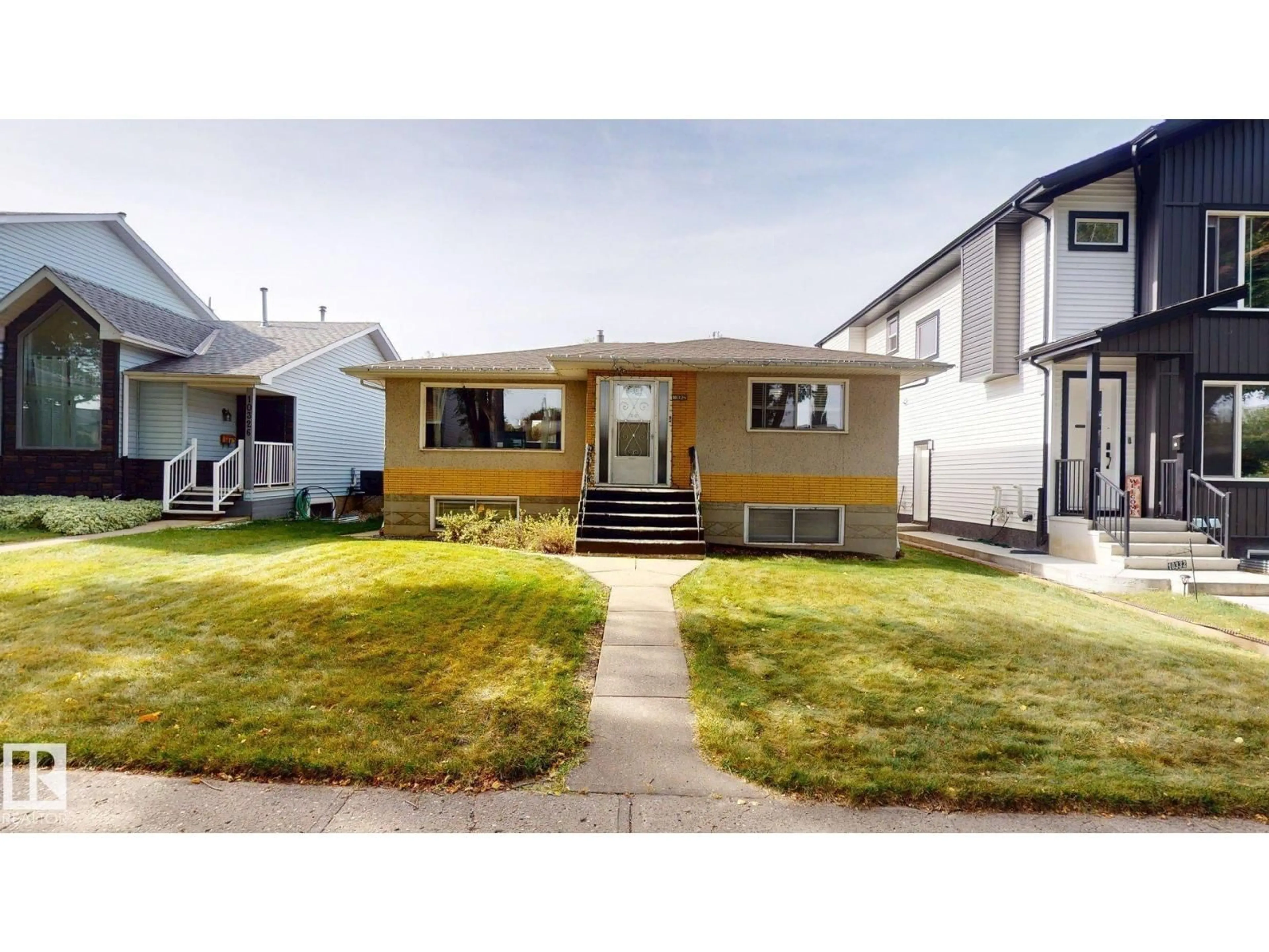 Home with vinyl exterior material, street for 10328 77 ST, Edmonton Alberta T6A3C3