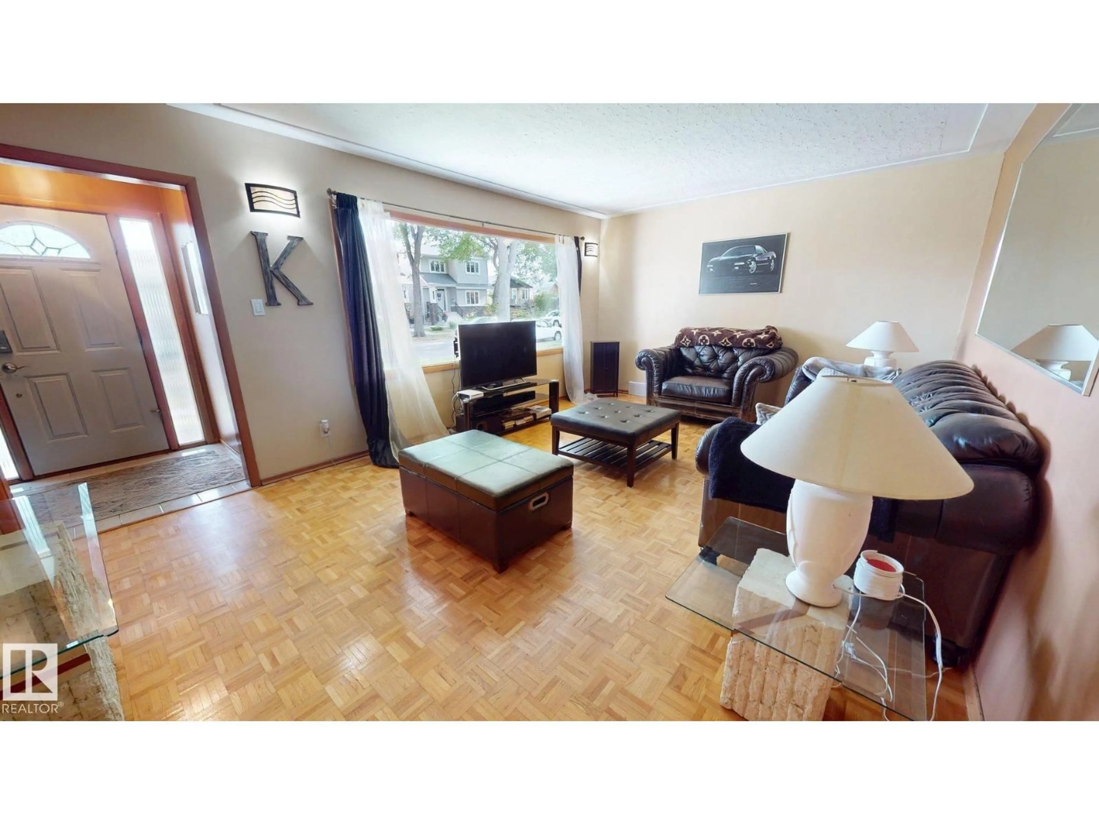 Living room with furniture, unknown for 10328 77 ST, Edmonton Alberta T6A3C3