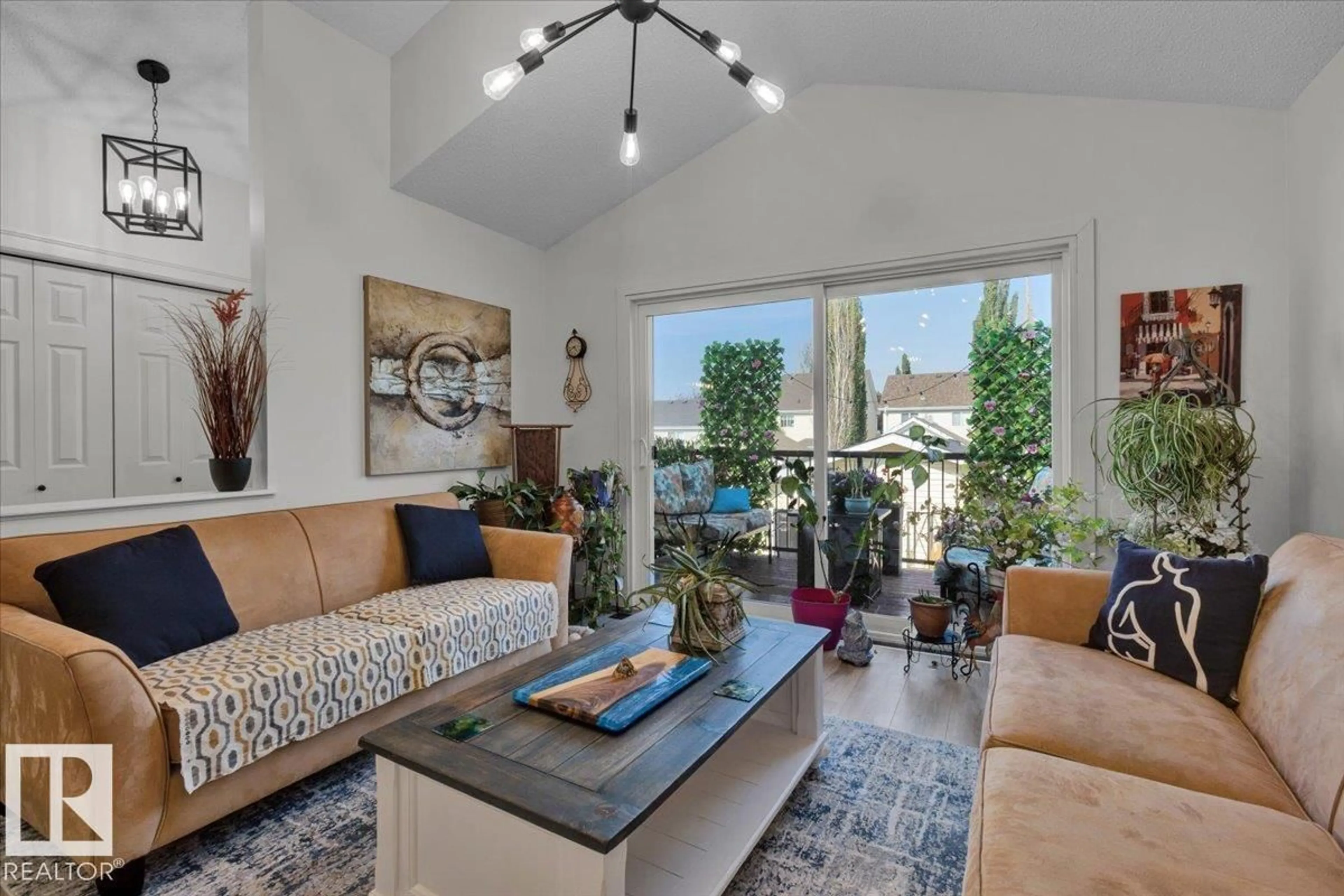 Living room with furniture, unknown for 7608 15 AV, Edmonton Alberta T6X1M1