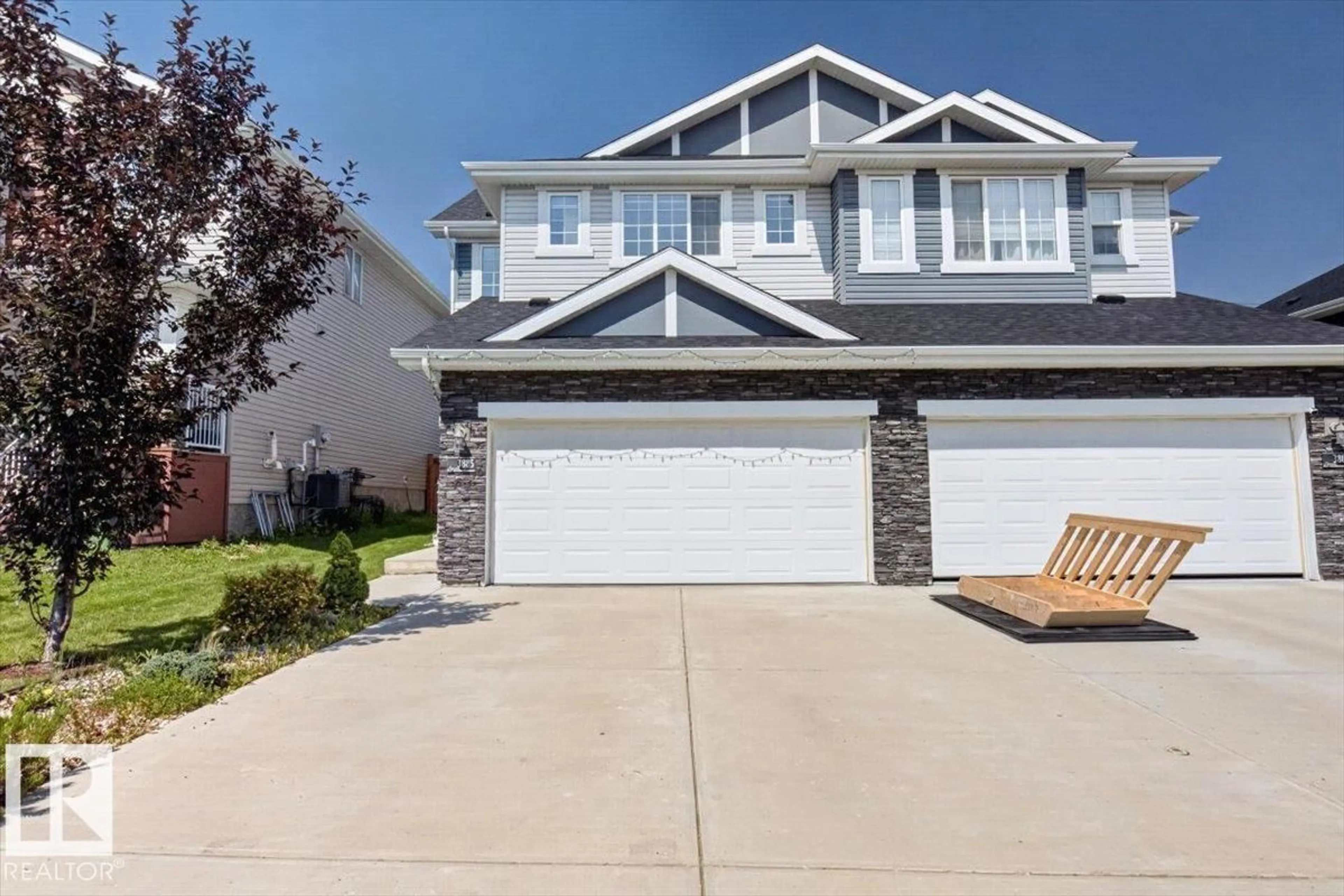 Home with vinyl exterior material, street for 3885 ROBINS CR, Edmonton Alberta T5S0M8
